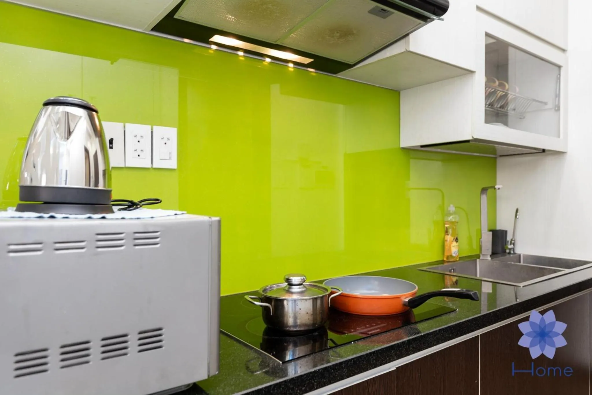 Kitchen or kitchenette in iHome Furnished Apartments with Free Gym & Pool, Airport Pick-Up Service