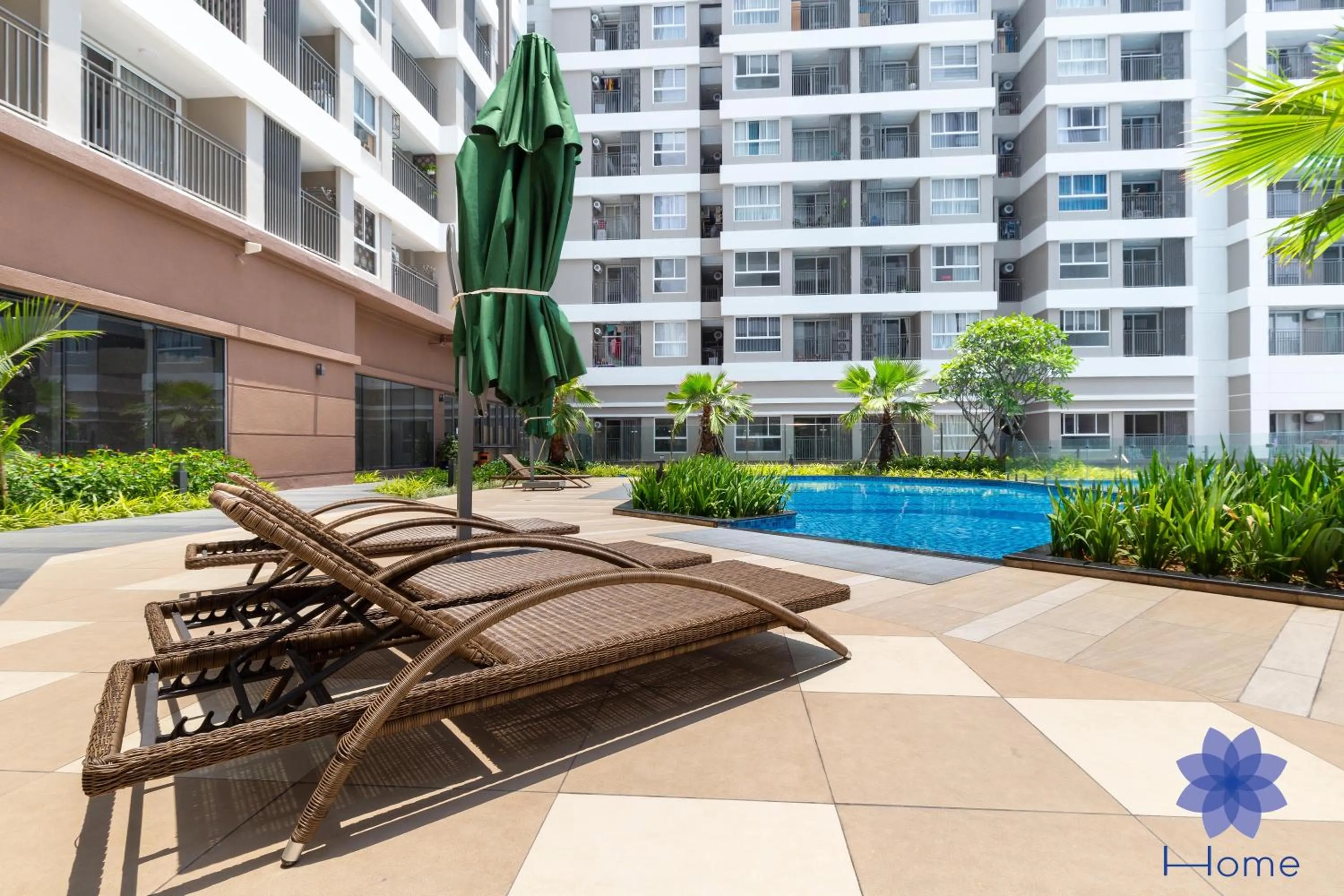 Swimming pool in iHome Furnished Apartments with Free Gym & Pool, Airport Pick-Up Service