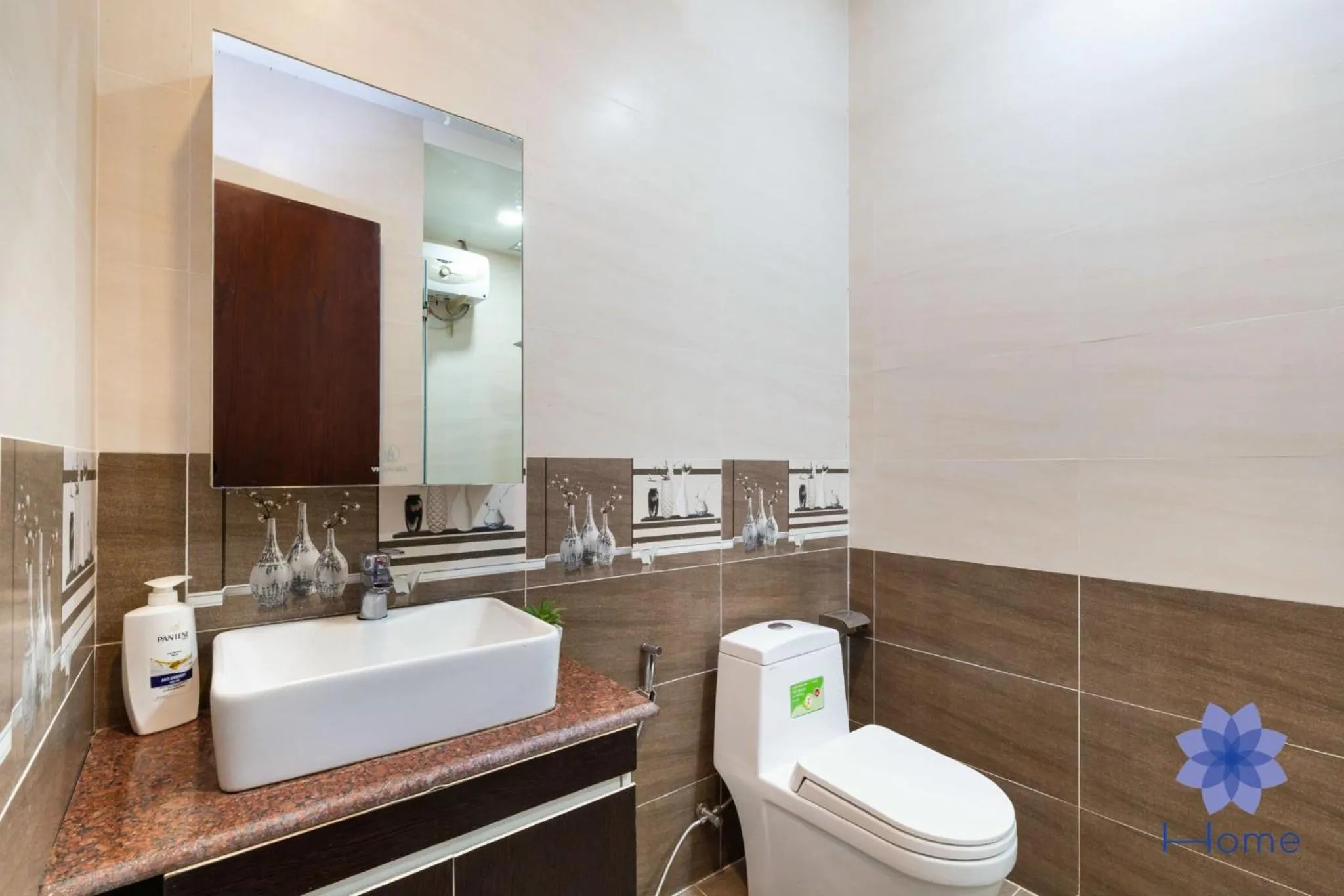 Bathroom in iHome Furnished Apartments with Free Gym & Pool, Airport Pick-Up Service