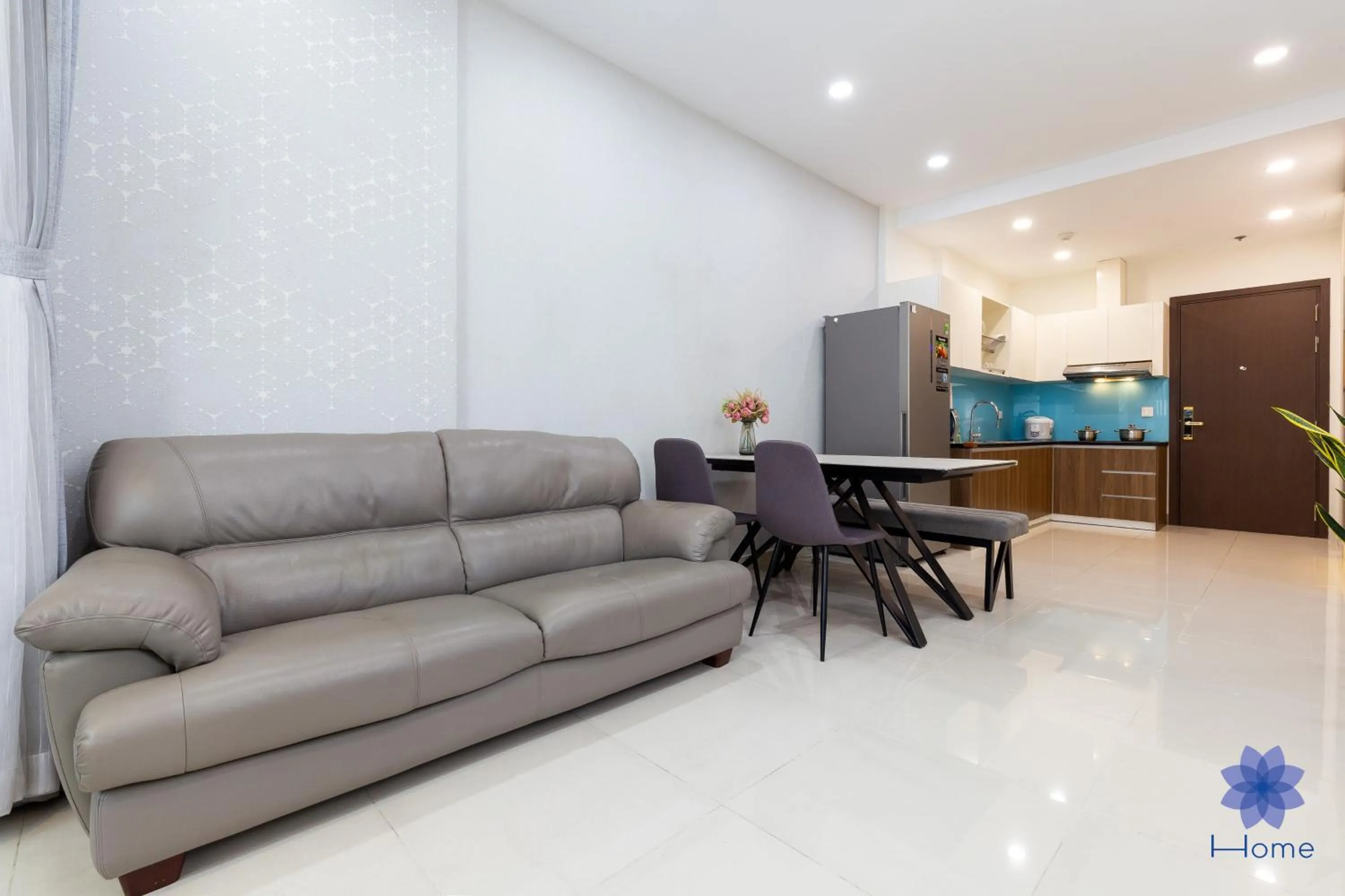 Living room in iHome Furnished Apartments with Free Gym & Pool, Airport Pick-Up Service