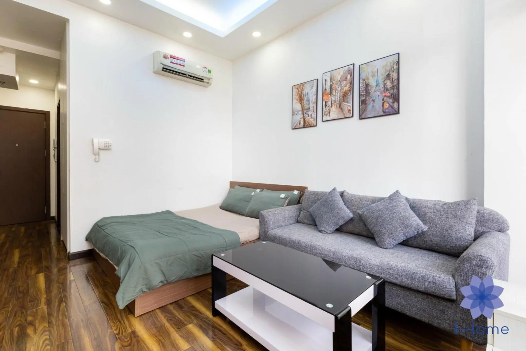 Living room, Bed in iHome Furnished Apartments with Free Gym & Pool, Airport Pick-Up Service