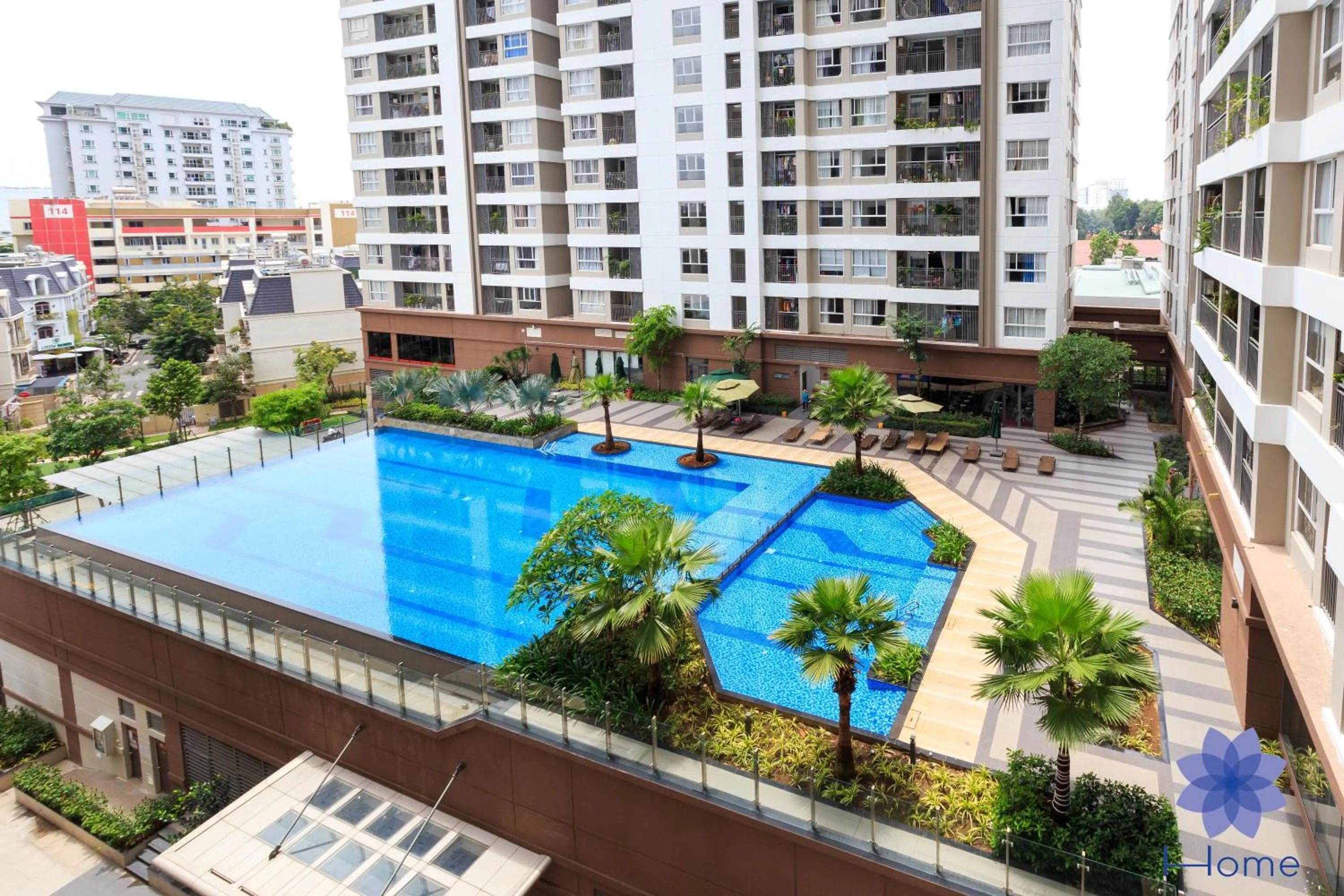 Swimming pool in iHome Furnished Apartments with Free Gym & Pool, Airport Pick-Up Service