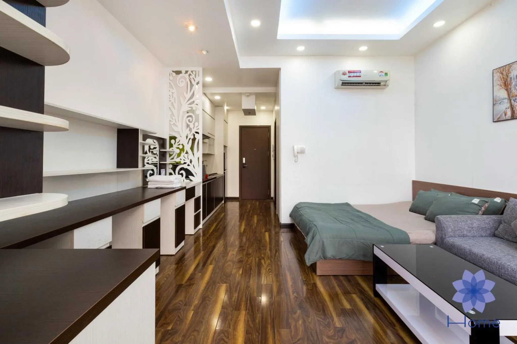 Seating area, Bed in iHome Furnished Apartments with Free Gym & Pool, Airport Pick-Up Service