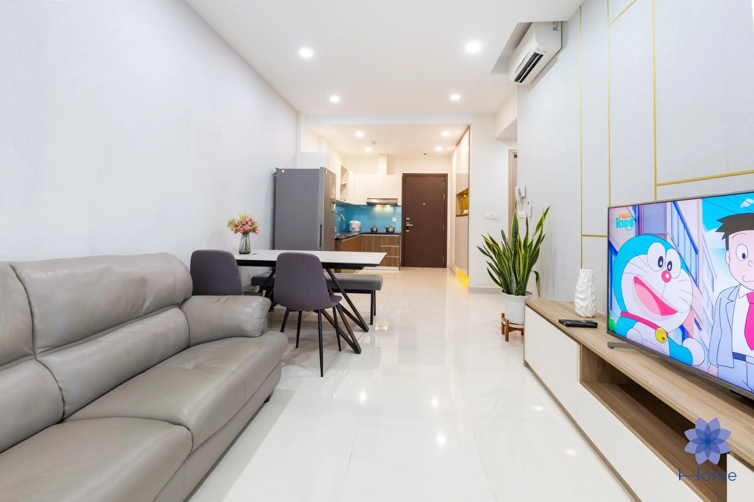 Living room in iHome Furnished Apartments with Free Gym & Pool, Airport Pick-Up Service