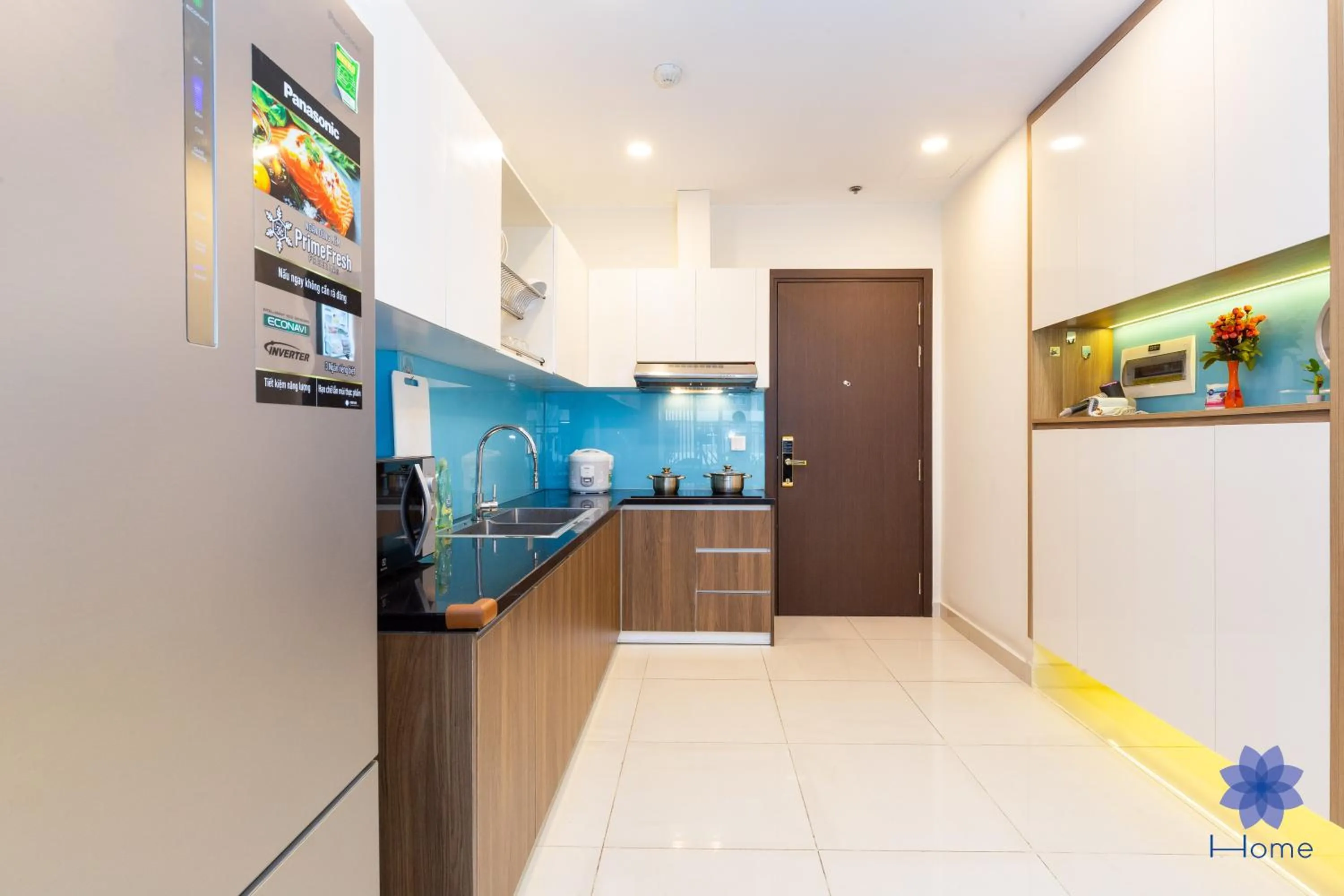 Kitchen or kitchenette in iHome Furnished Apartments with Free Gym & Pool, Airport Pick-Up Service
