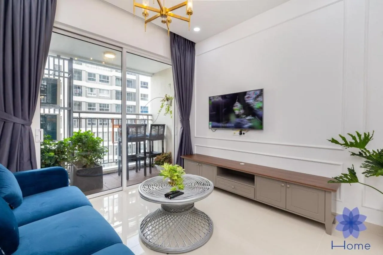 TV and multimedia in iHome Furnished Apartments with Free Gym & Pool, Airport Pick-Up Service