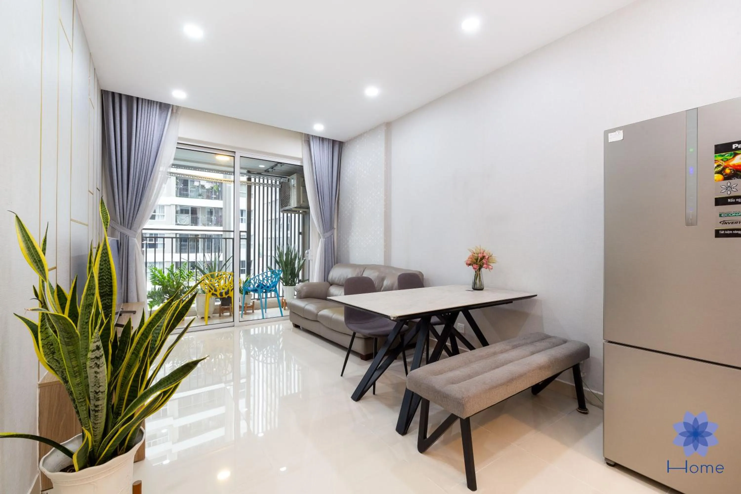 Living room in iHome Furnished Apartments with Free Gym & Pool, Airport Pick-Up Service