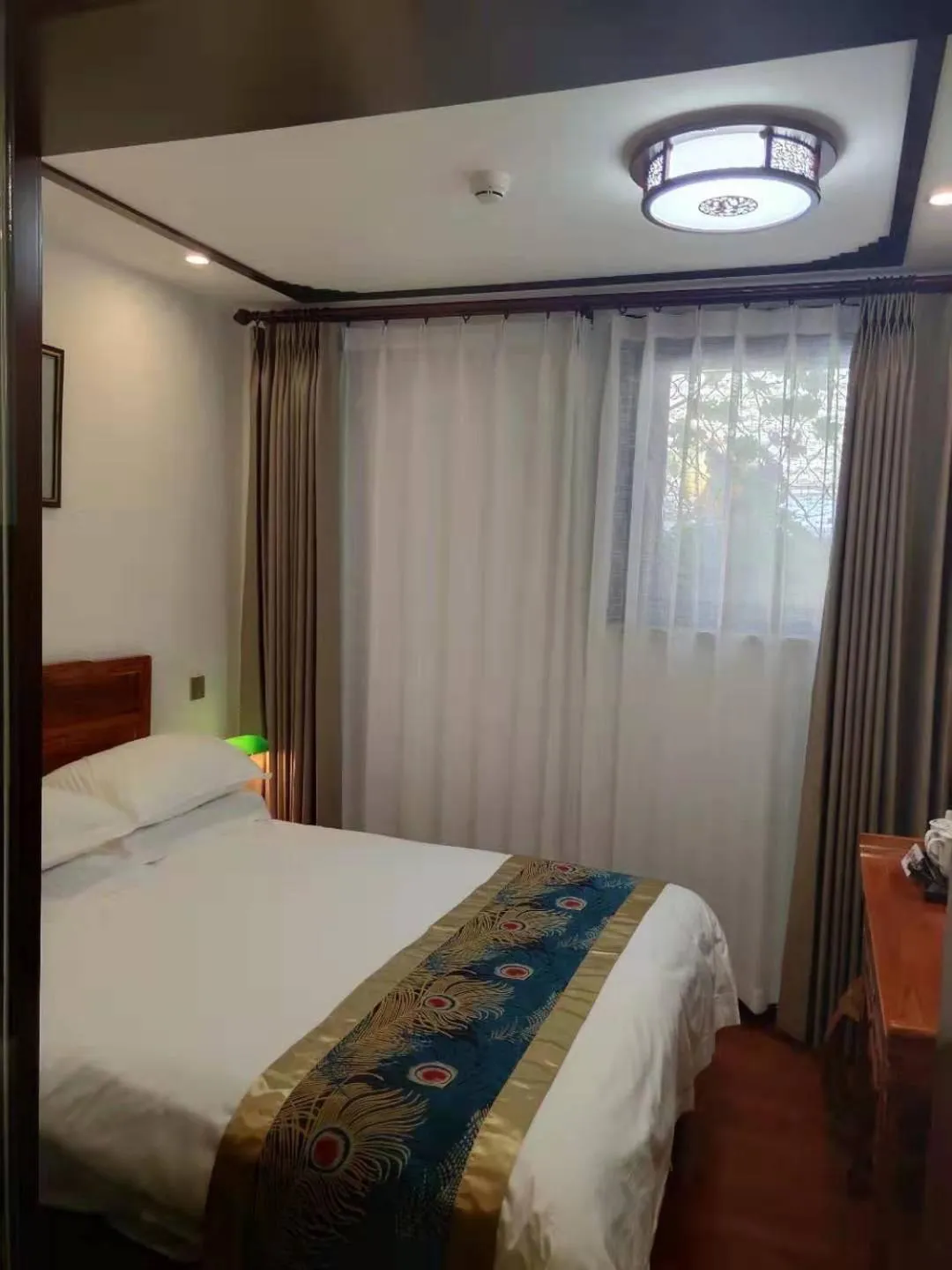 Bed in Qinfu Hotel Beijing Nanluogu Lane Houhai