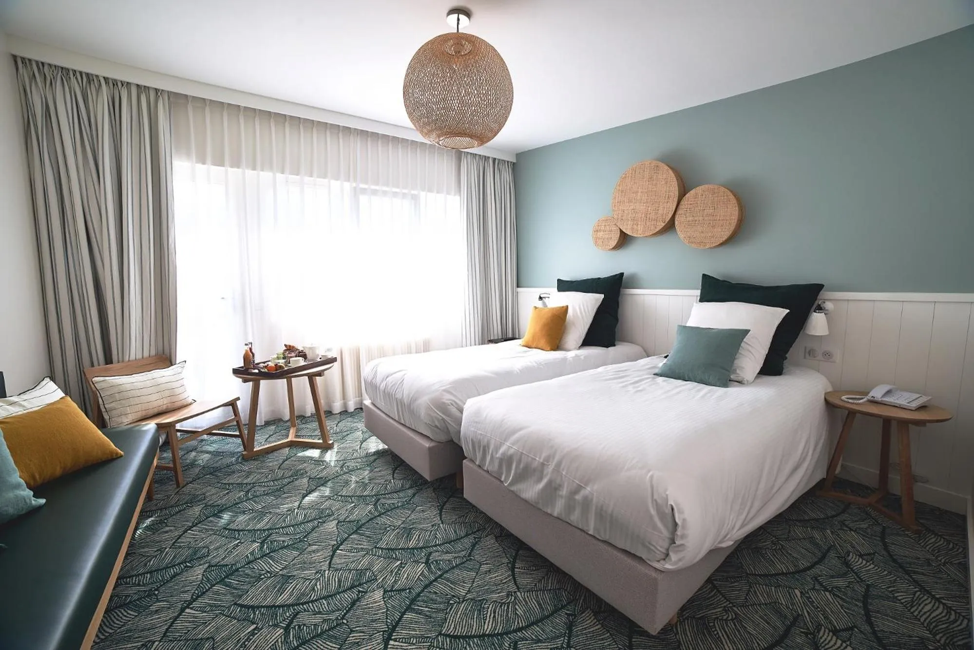 Bed in Le Manoir Hôtel Le Touquet Paris Plage