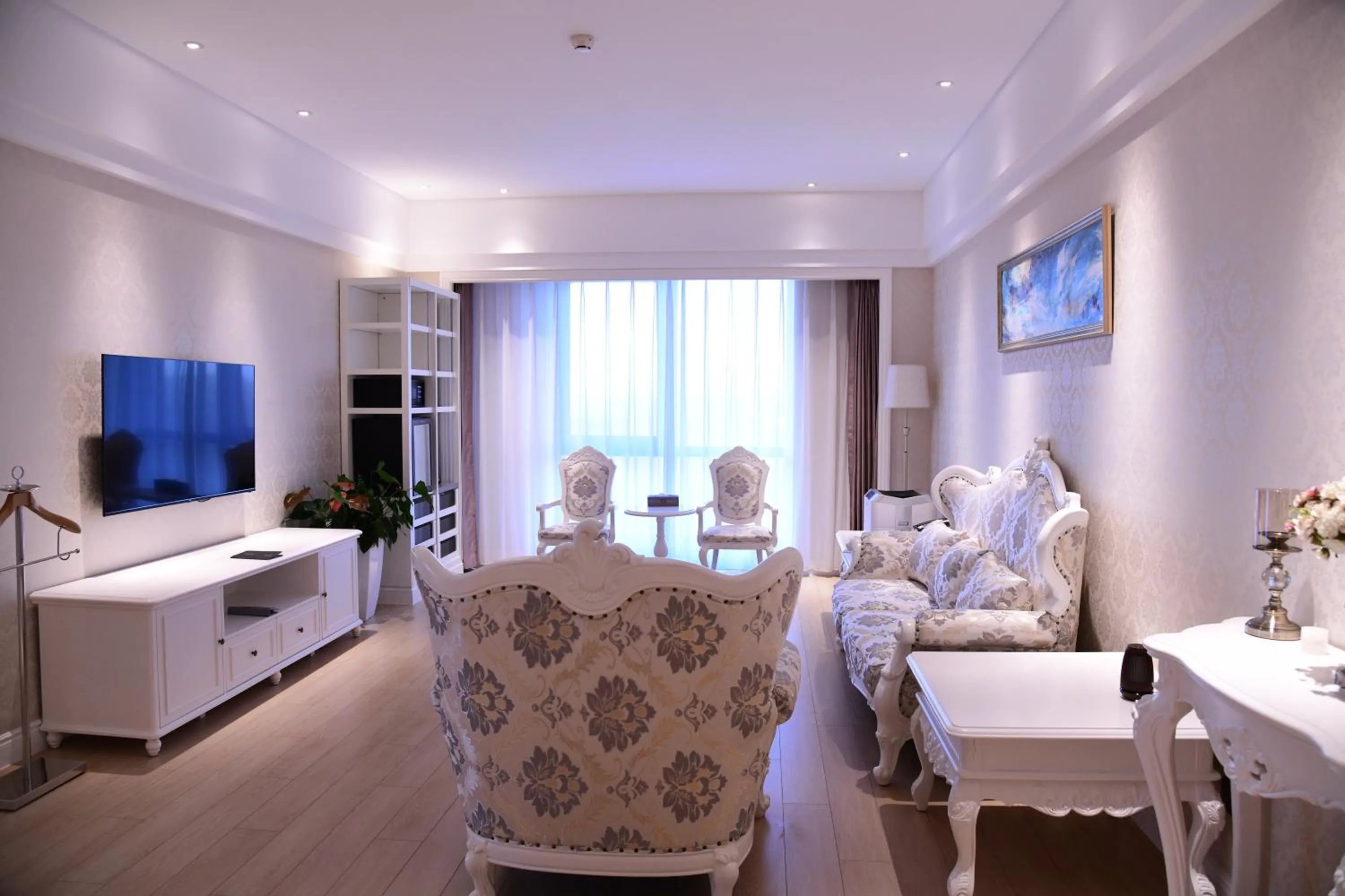 Bed in GUOCE Beijing Capital Airport Hotel & Convention Center