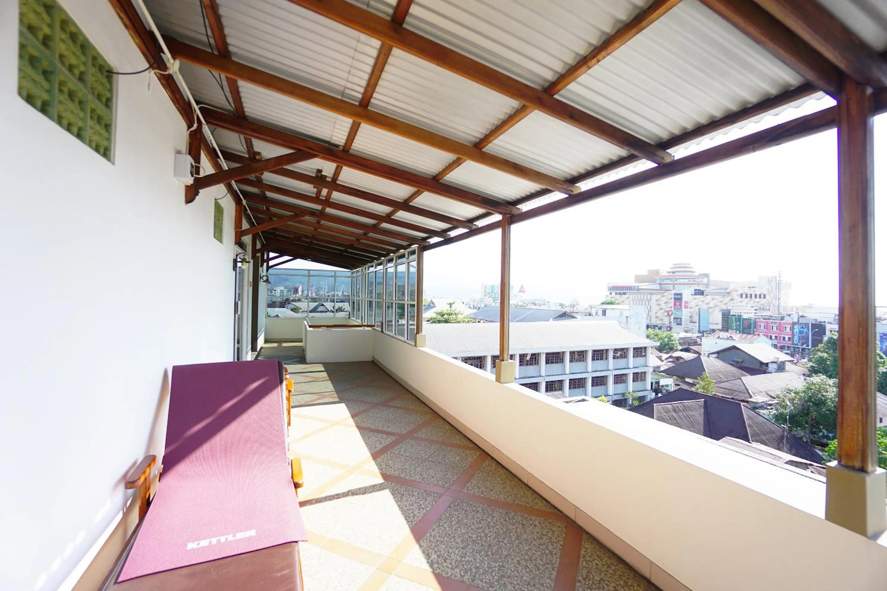 Balcony/Terrace in RedDoorz Brand MAN12045 RedDoorz near Megamall Manado