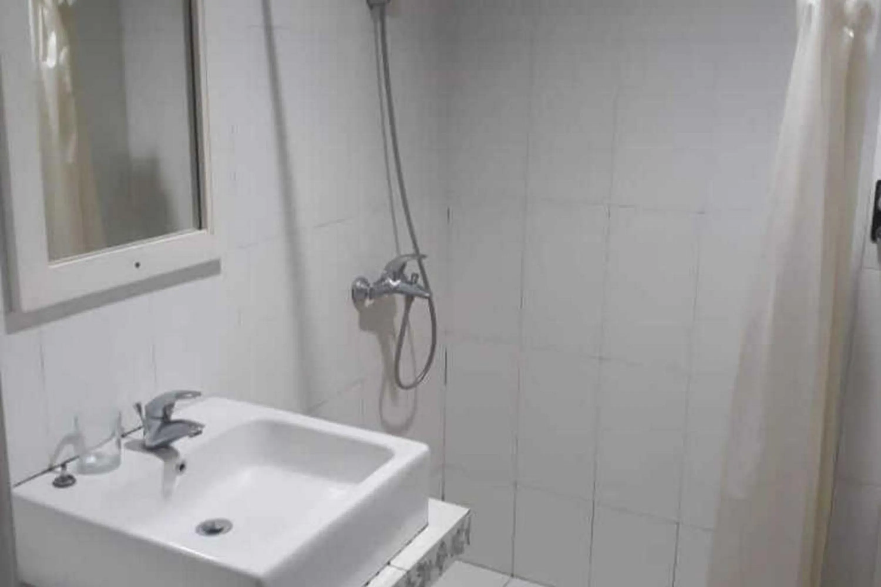 Shower in RedDoorz Brand MAN12045 RedDoorz near Megamall Manado