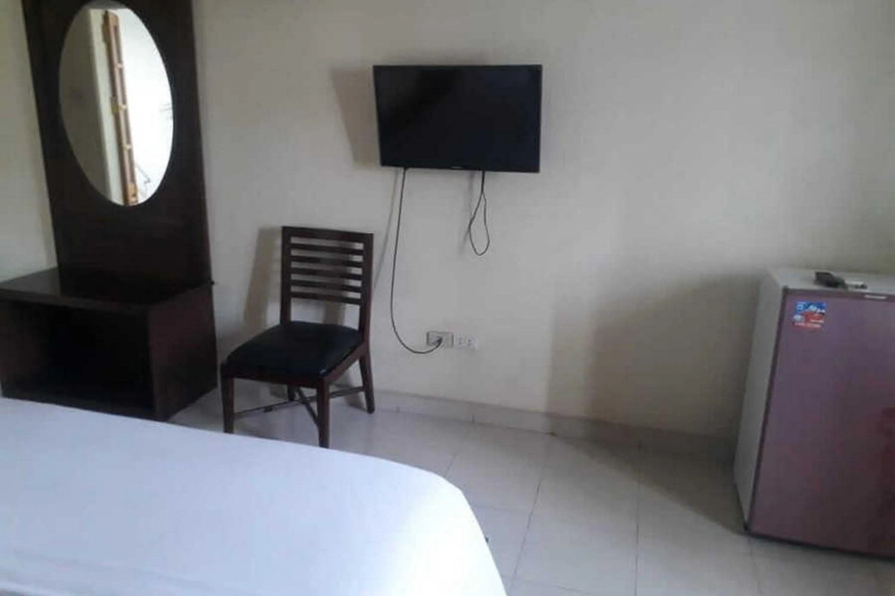 TV and multimedia, Bed in RedDoorz Brand MAN12045 RedDoorz near Megamall Manado