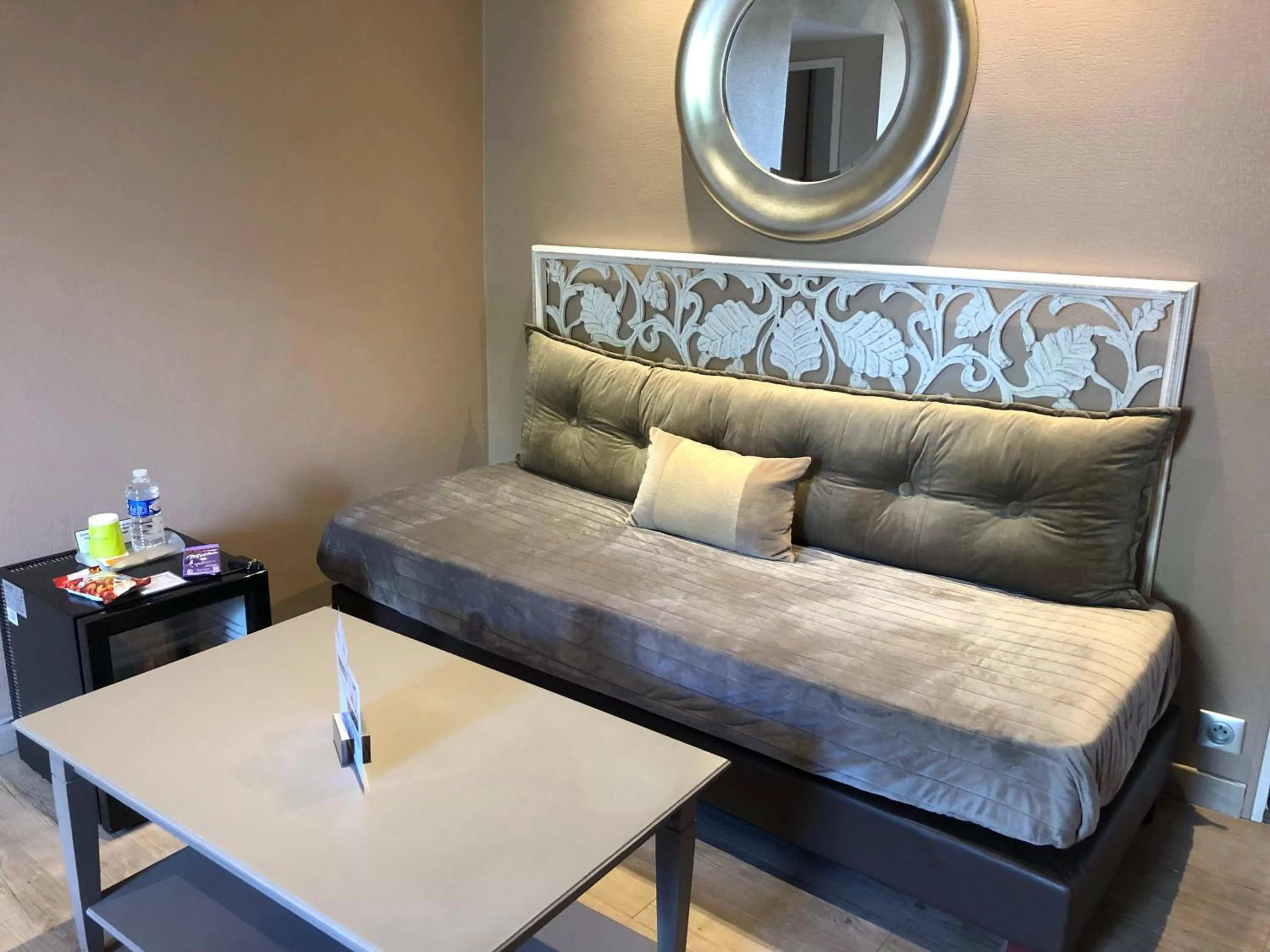 Seating area in Logis Hotel Oasis