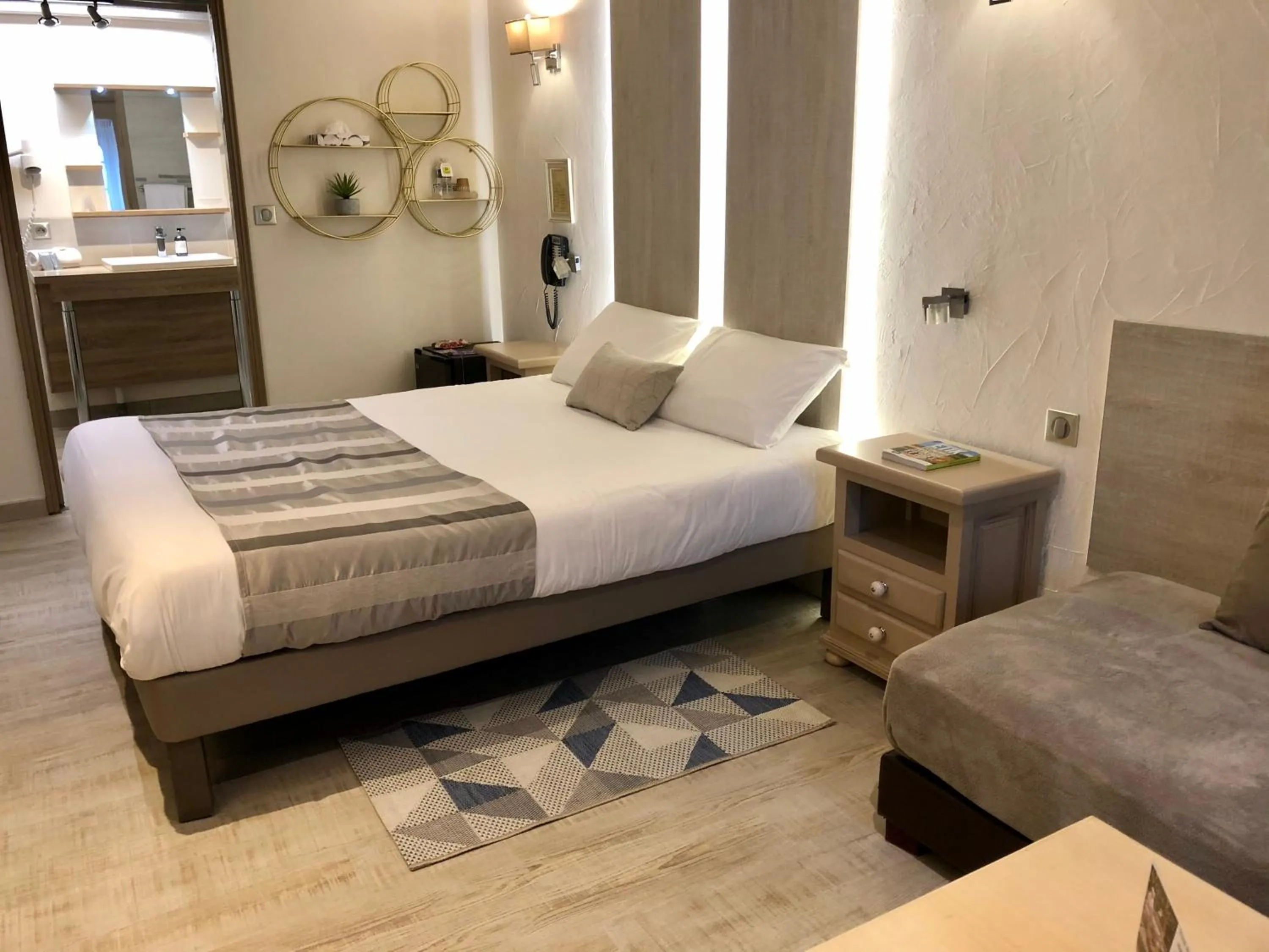 Photo of the whole room, Bed in Logis Hotel Oasis