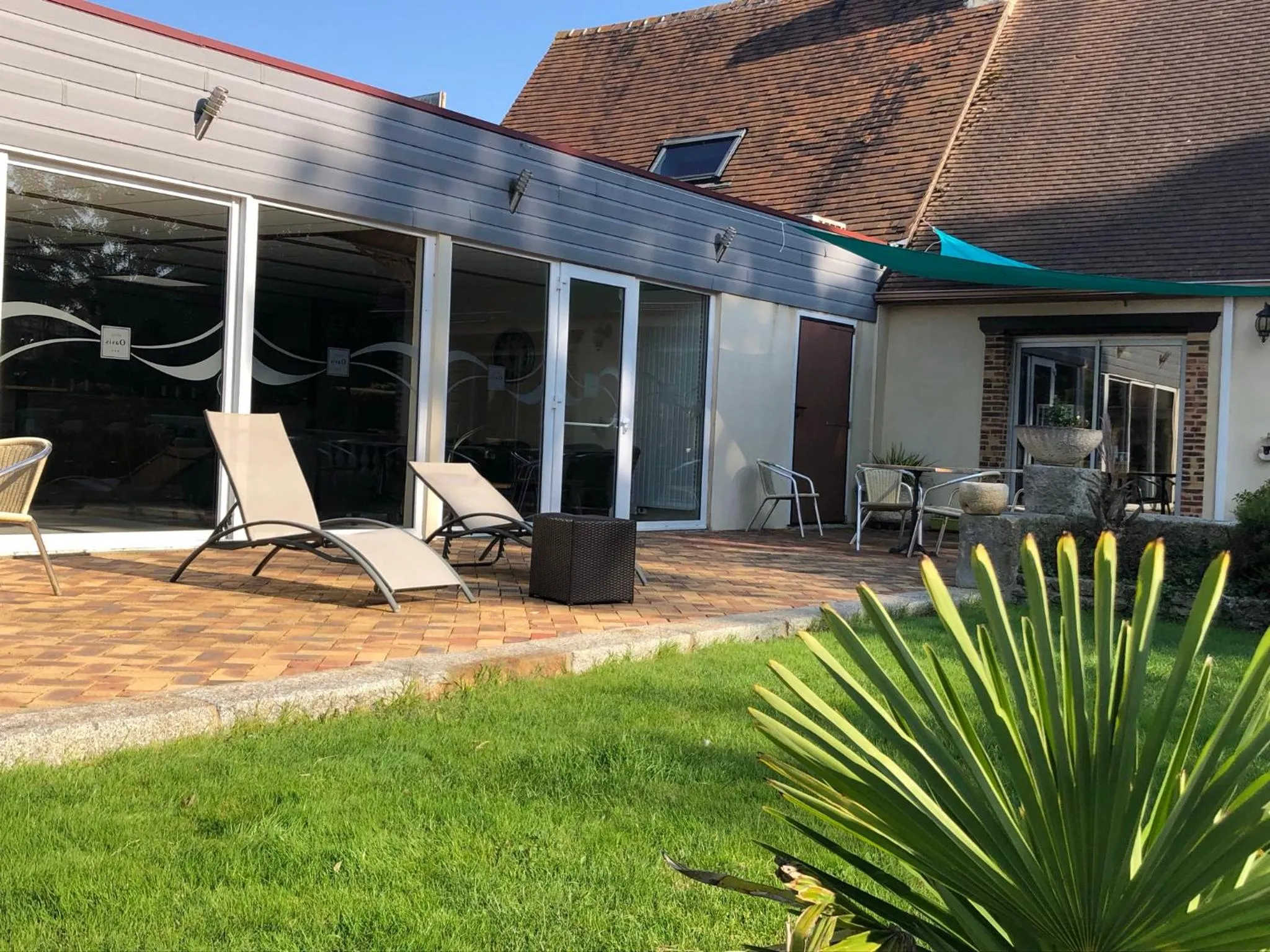 Patio in Logis Hotel Oasis