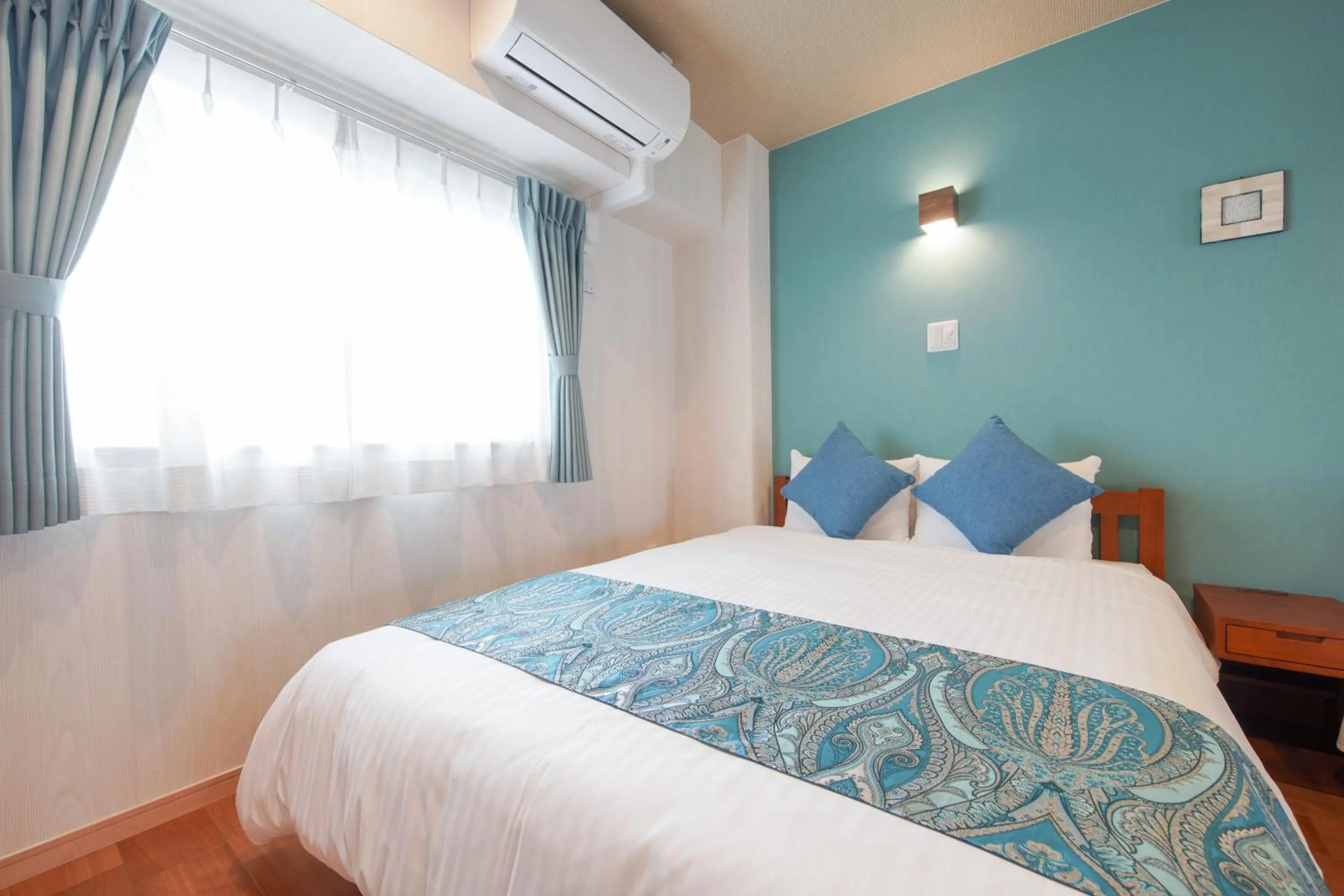 Bed in Hotel Haabesu Okinawa