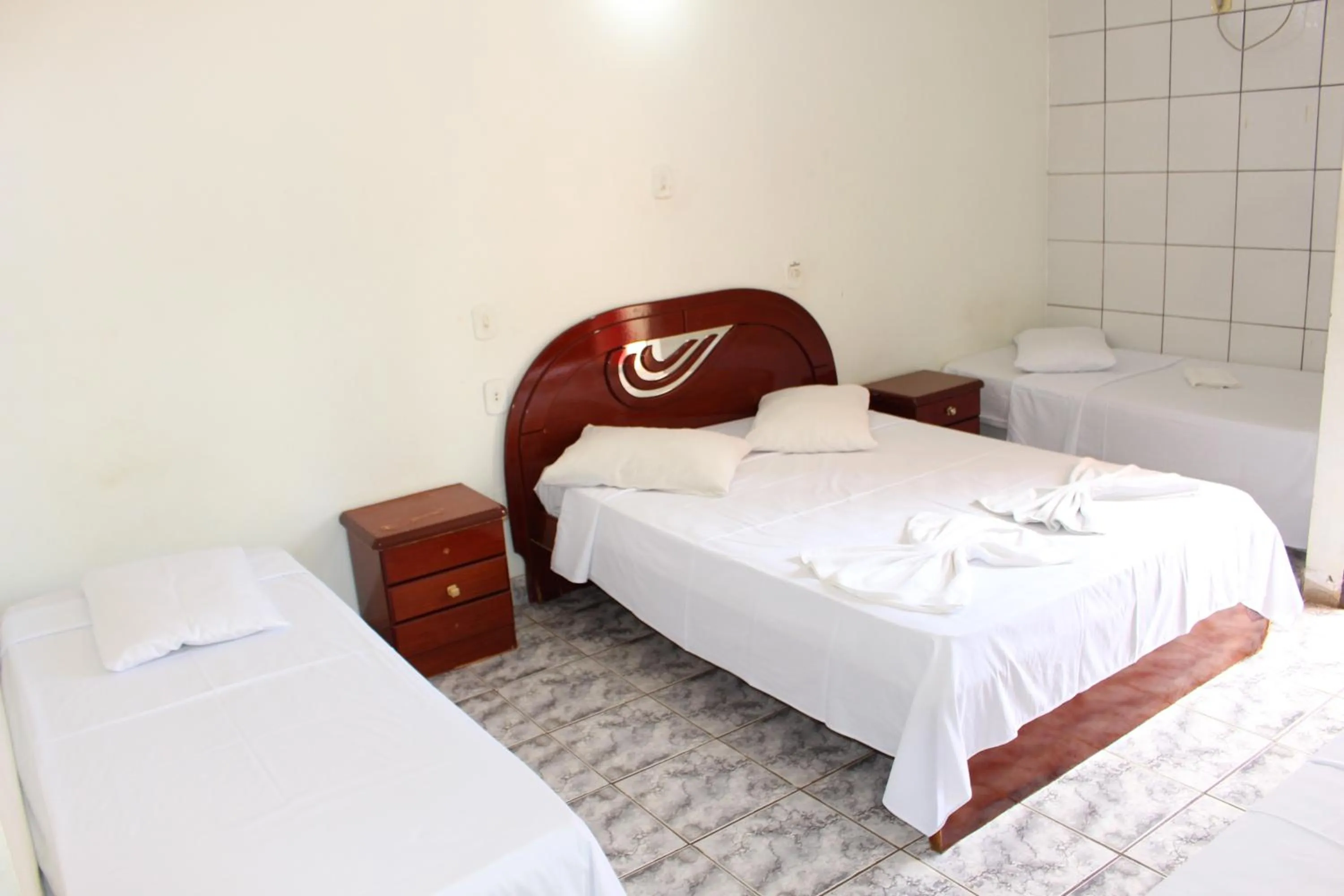 Bed in Bica Pau Hotel