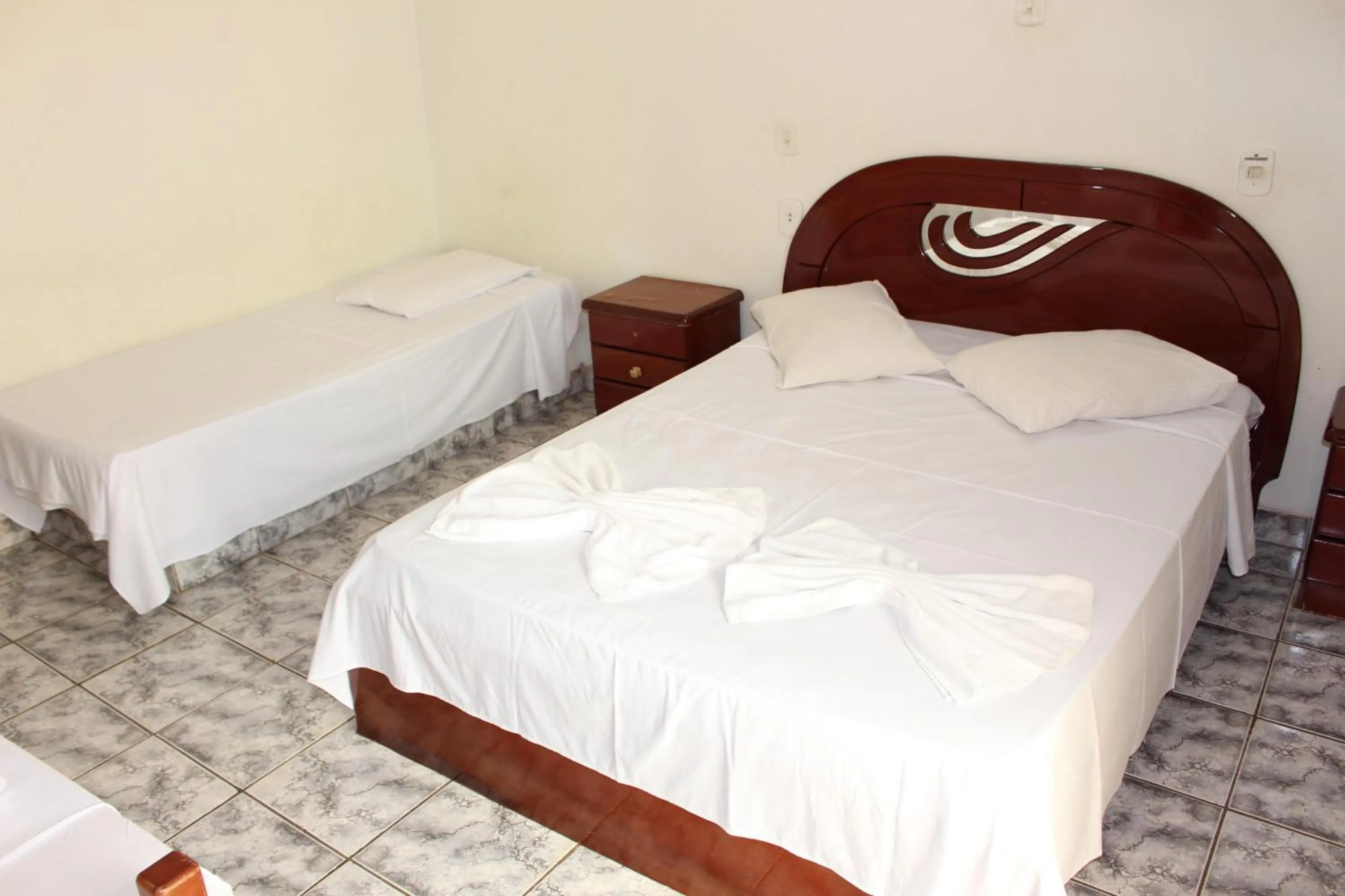 Bed in Bica Pau Hotel