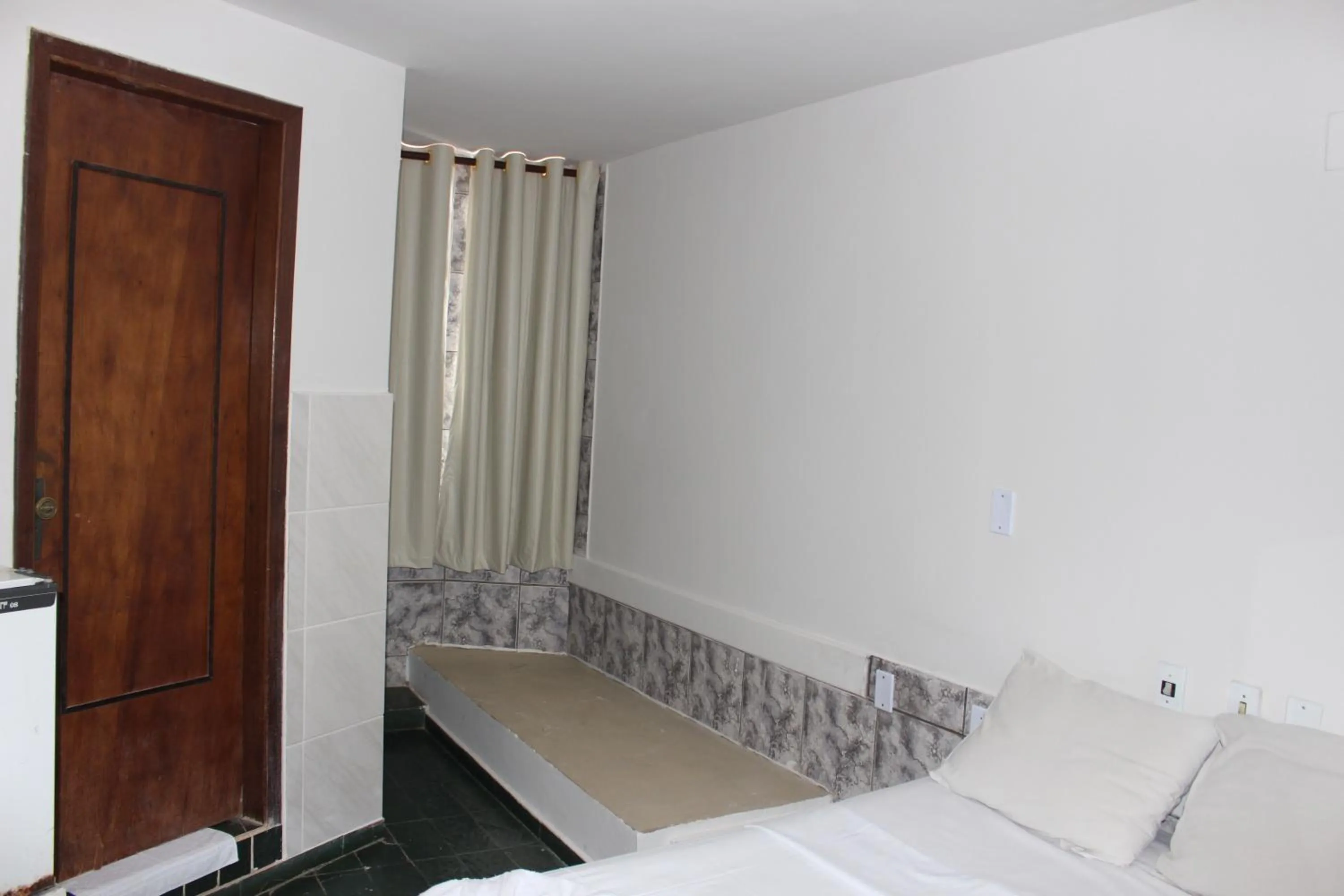 Bed in Bica Pau Hotel