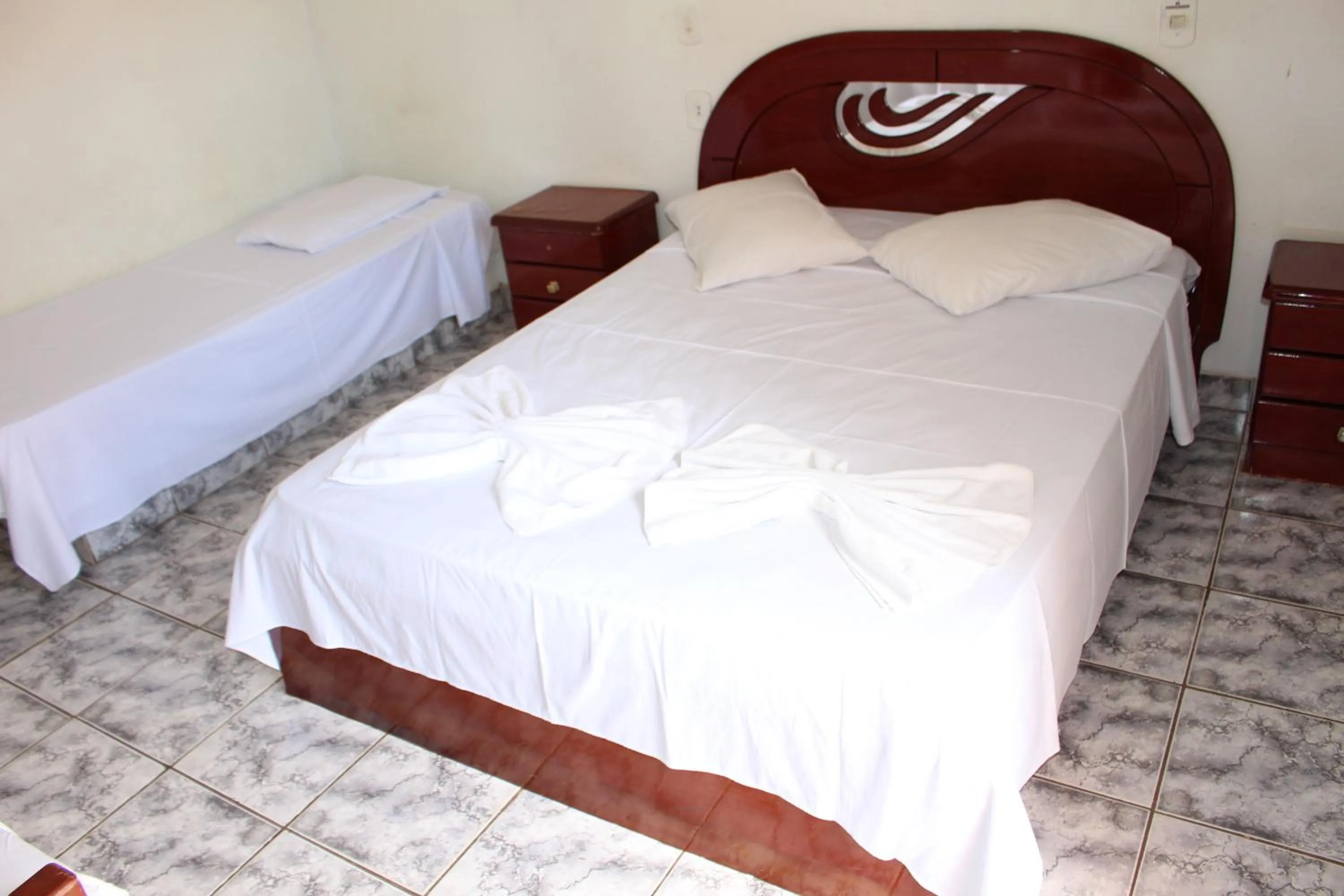 Bed in Bica Pau Hotel