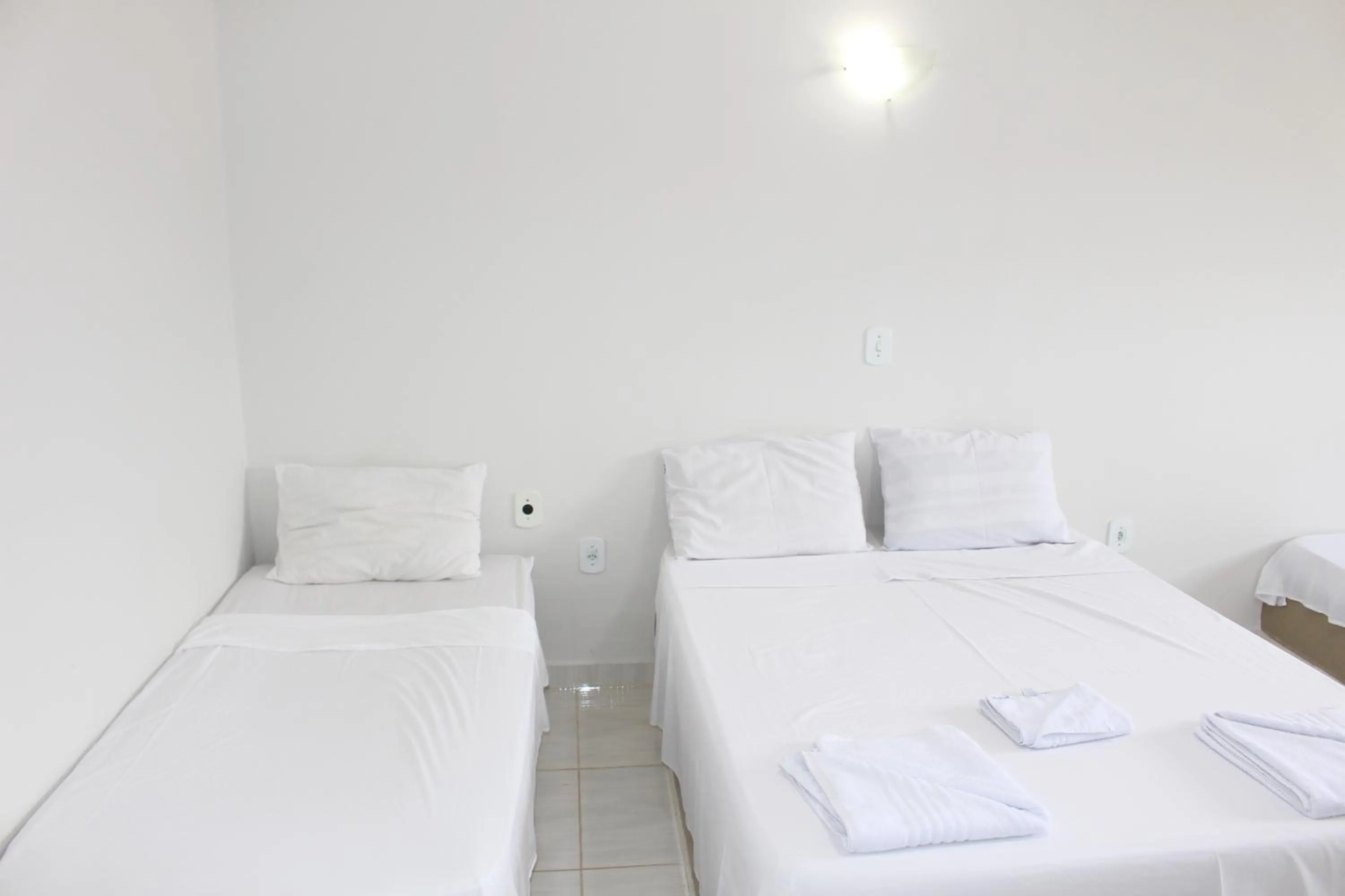 Bed in Bica Pau Hotel