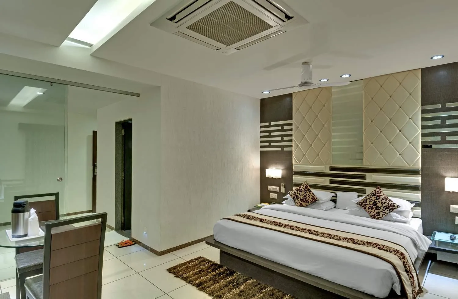 Bed in Pearl Hotel & Banquets Ahmedabad