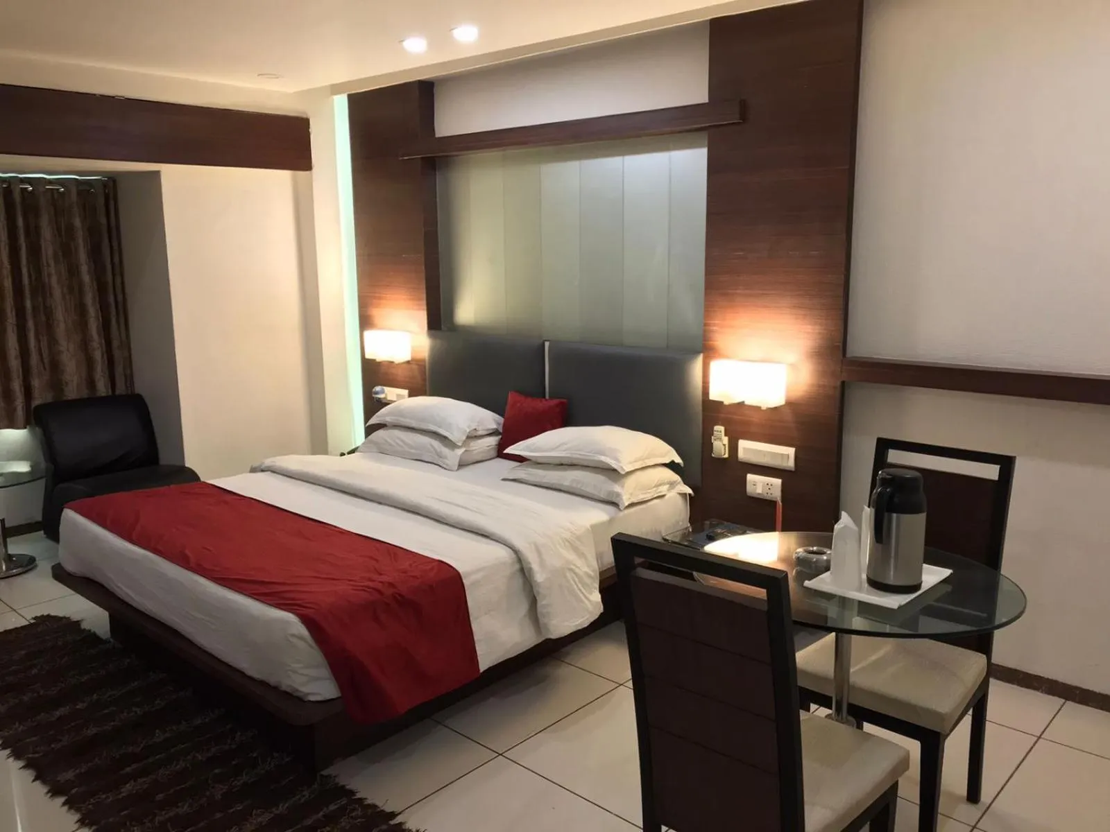 Bed in Pearl Hotel & Banquets Ahmedabad