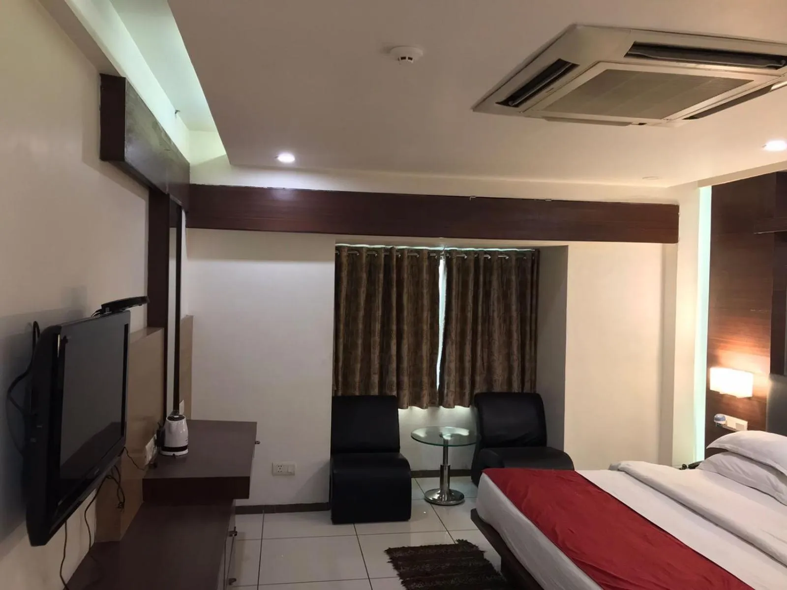 Bed in Pearl Hotel & Banquets Ahmedabad