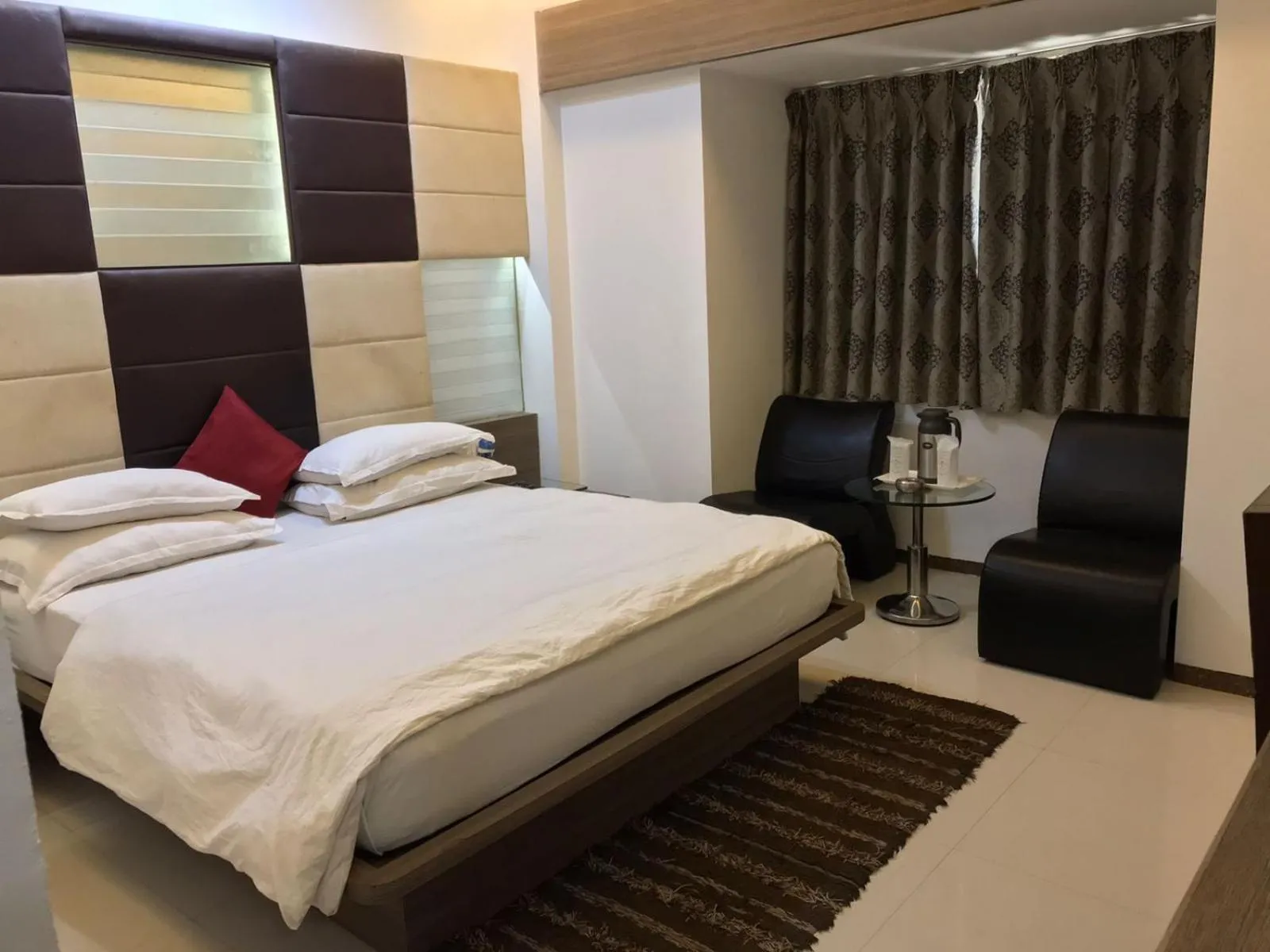 Bed in Pearl Hotel & Banquets Ahmedabad