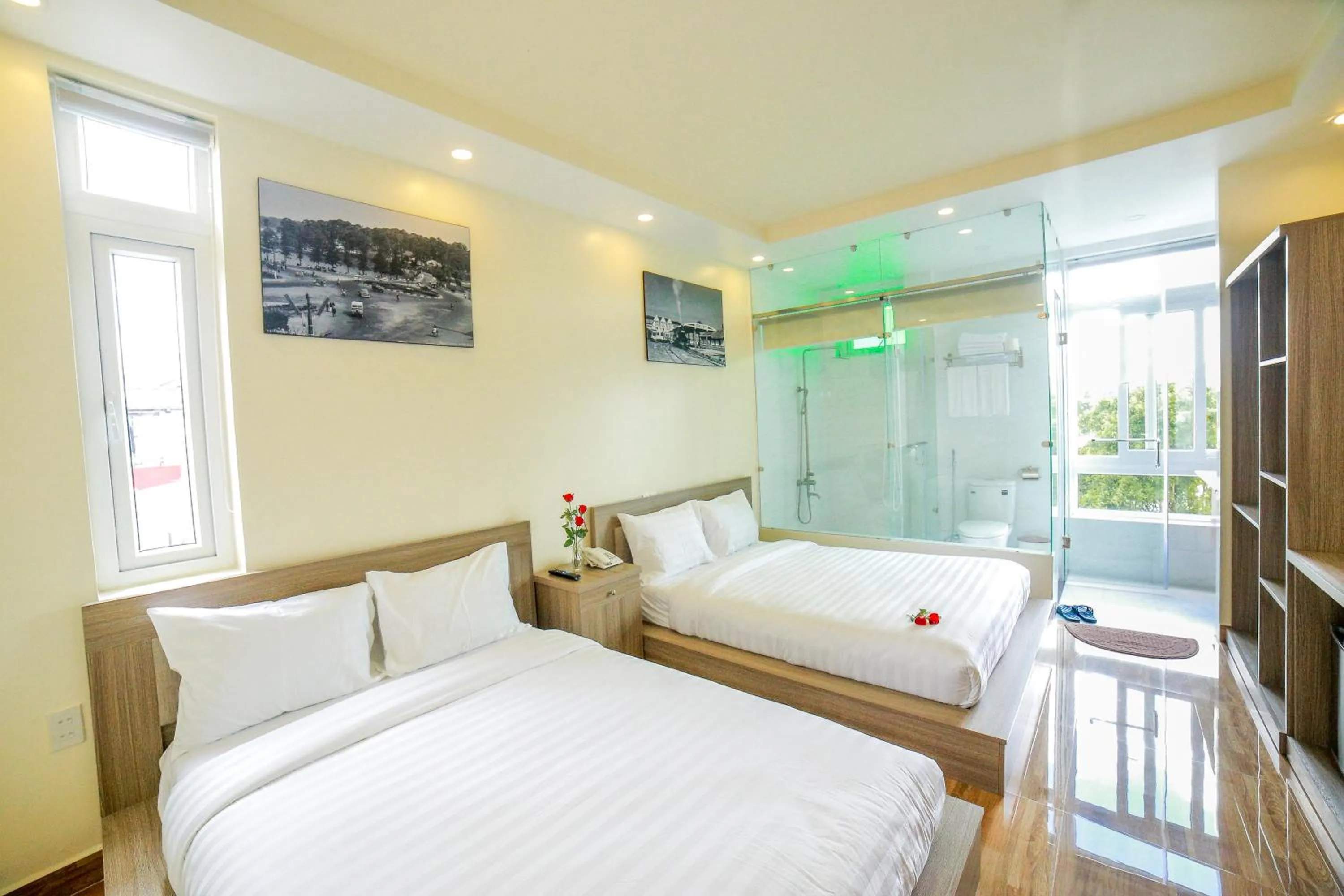 Photo of the whole room, Bed in Nhật Nguyên Hotel