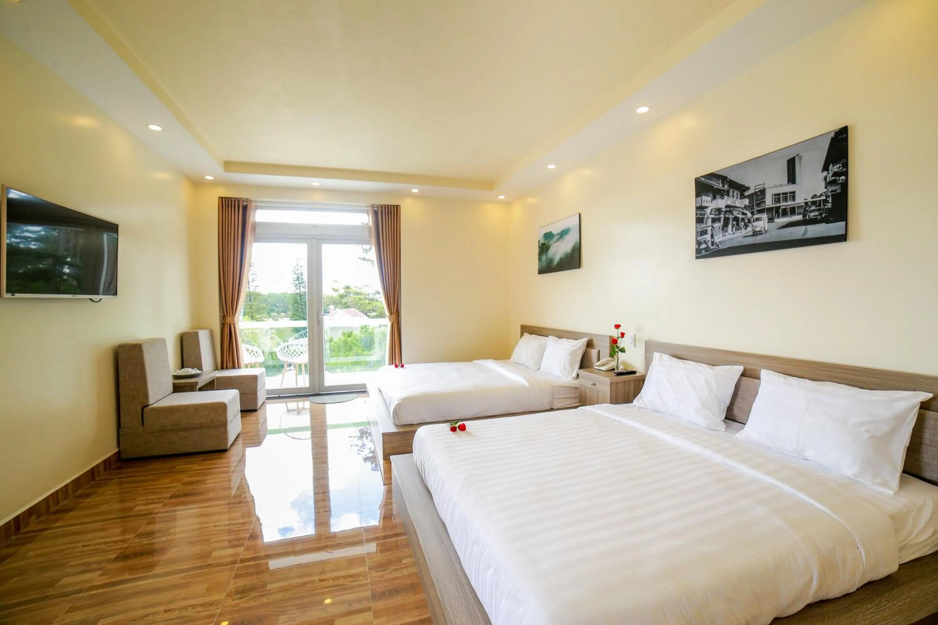 Photo of the whole room, Bed in Nhật Nguyên Hotel