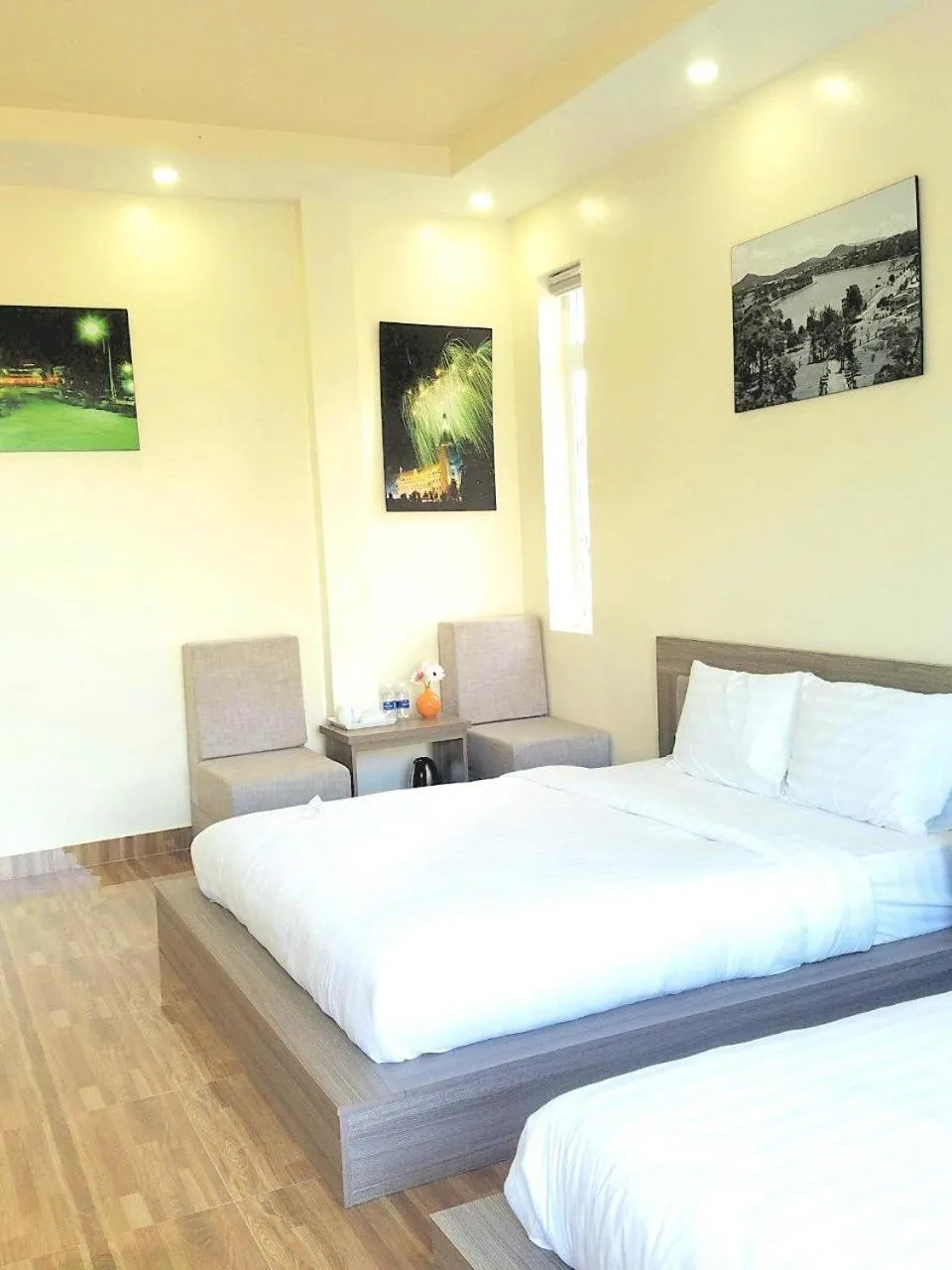 Photo of the whole room, Bed in Nhật Nguyên Hotel