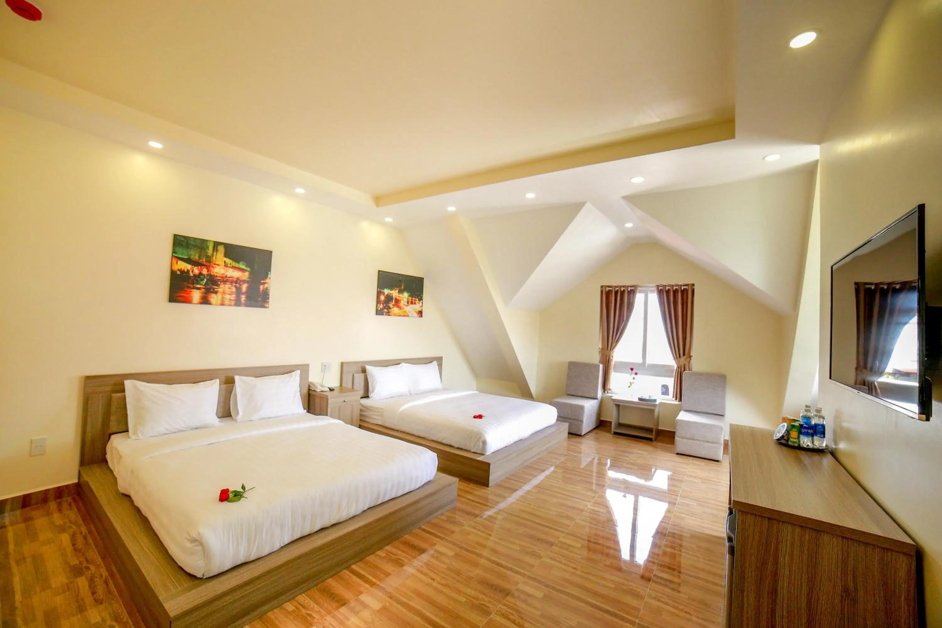 Photo of the whole room, Bed in Nhật Nguyên Hotel