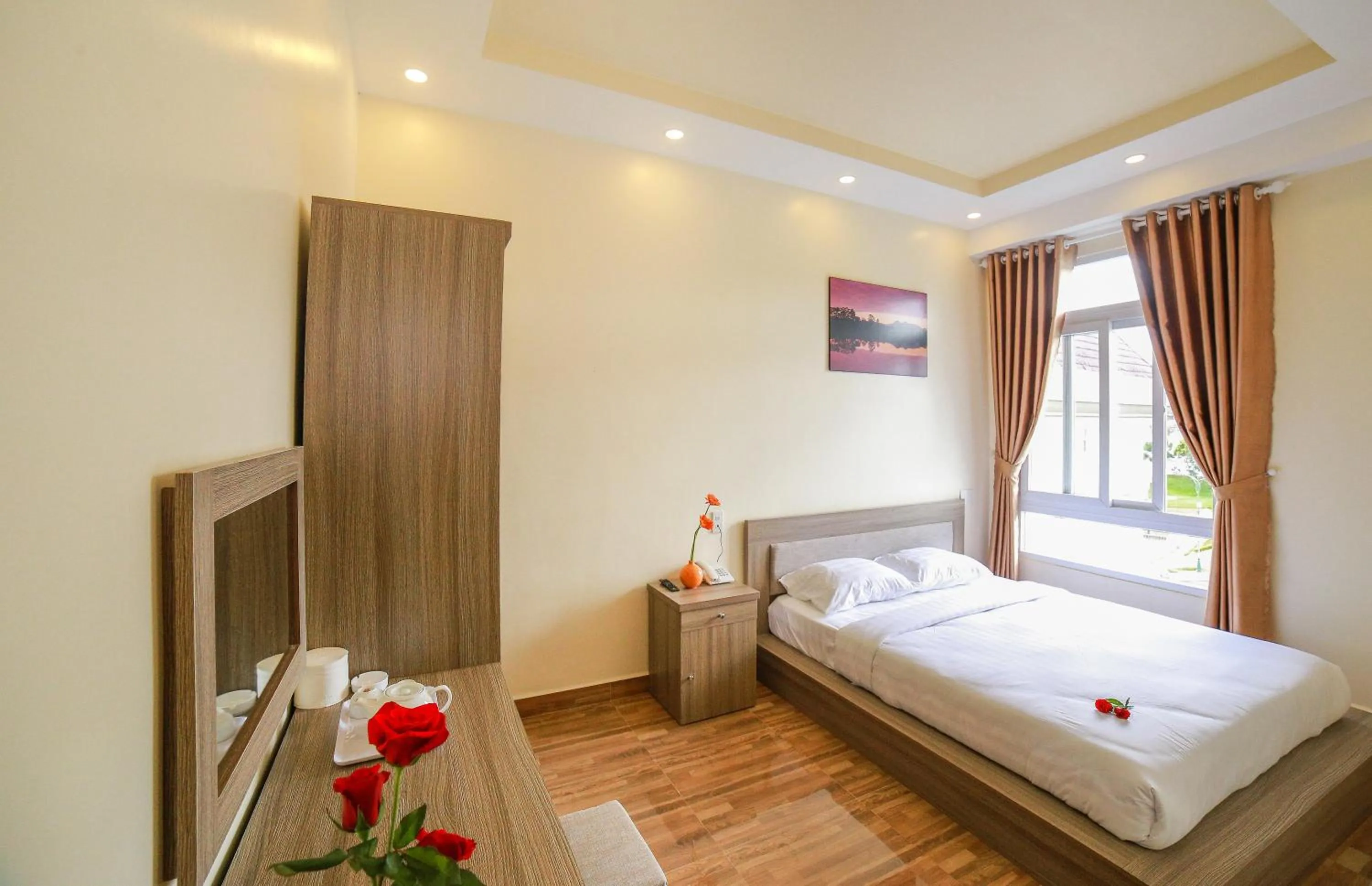 Photo of the whole room, Bed in Nhật Nguyên Hotel