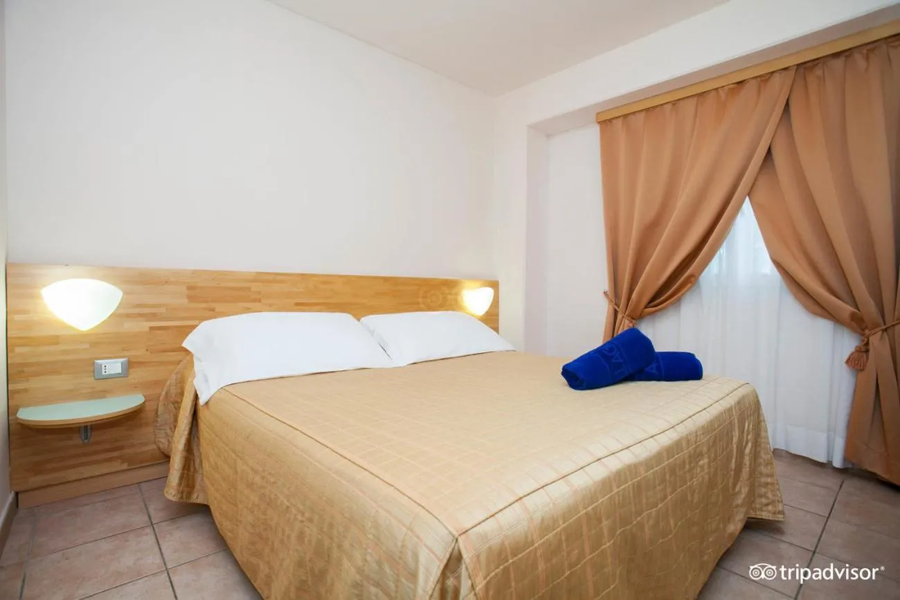 Bedroom, Bed in Villaggio Albatros Resort
