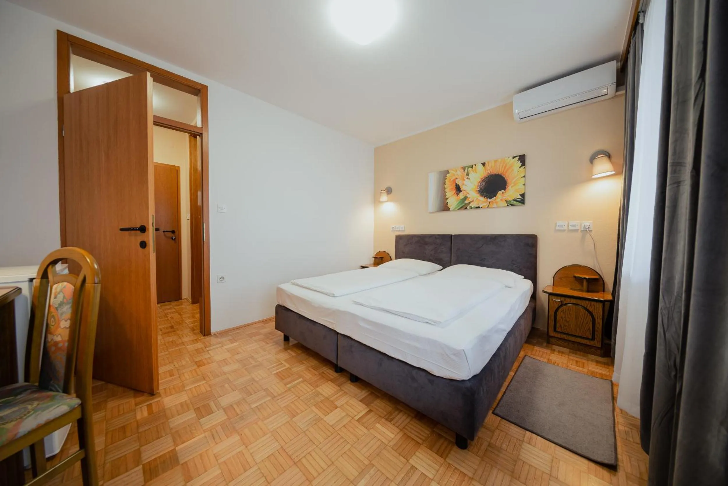 Bed in Hotel Maj Inn