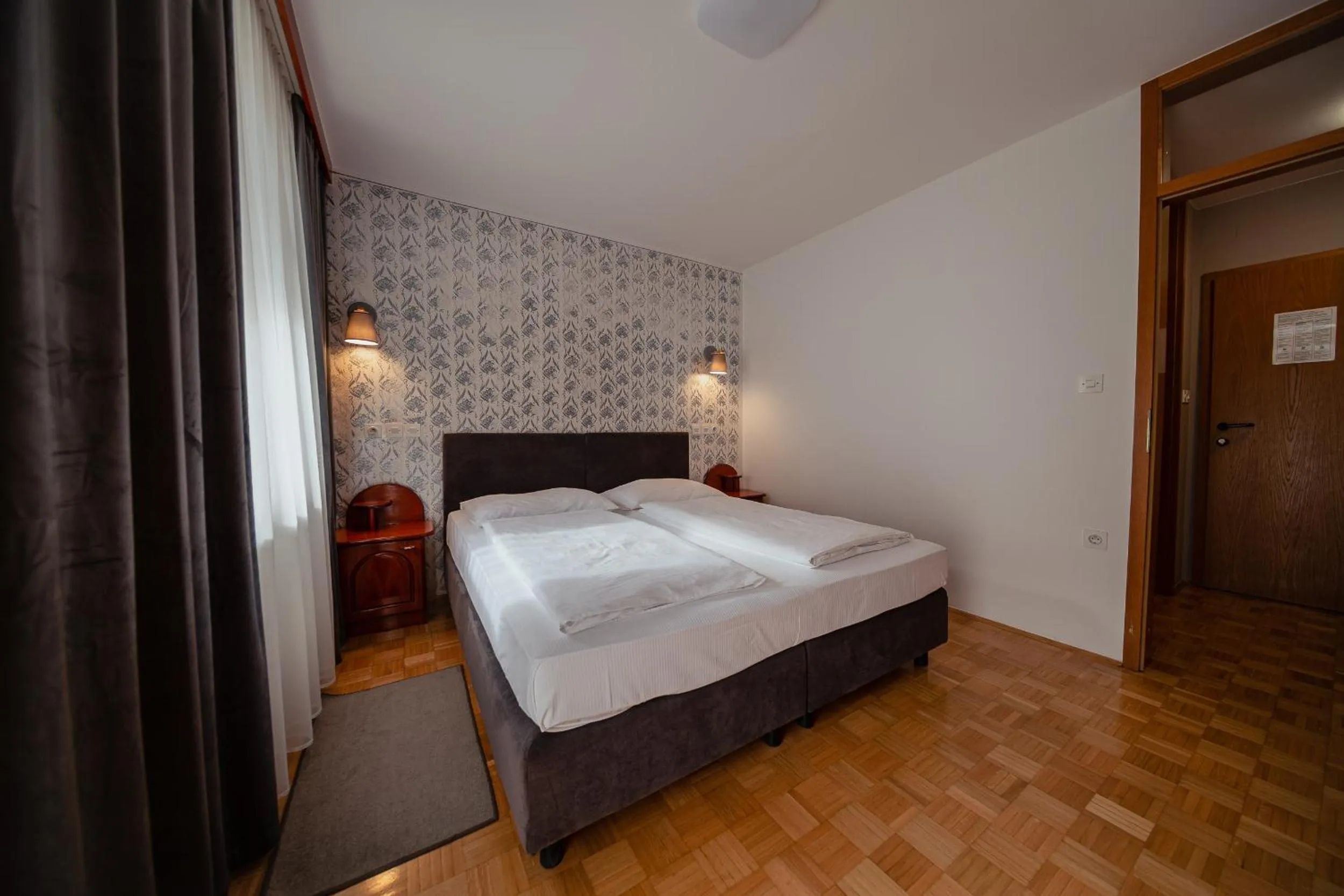 Bed in Hotel Maj Inn