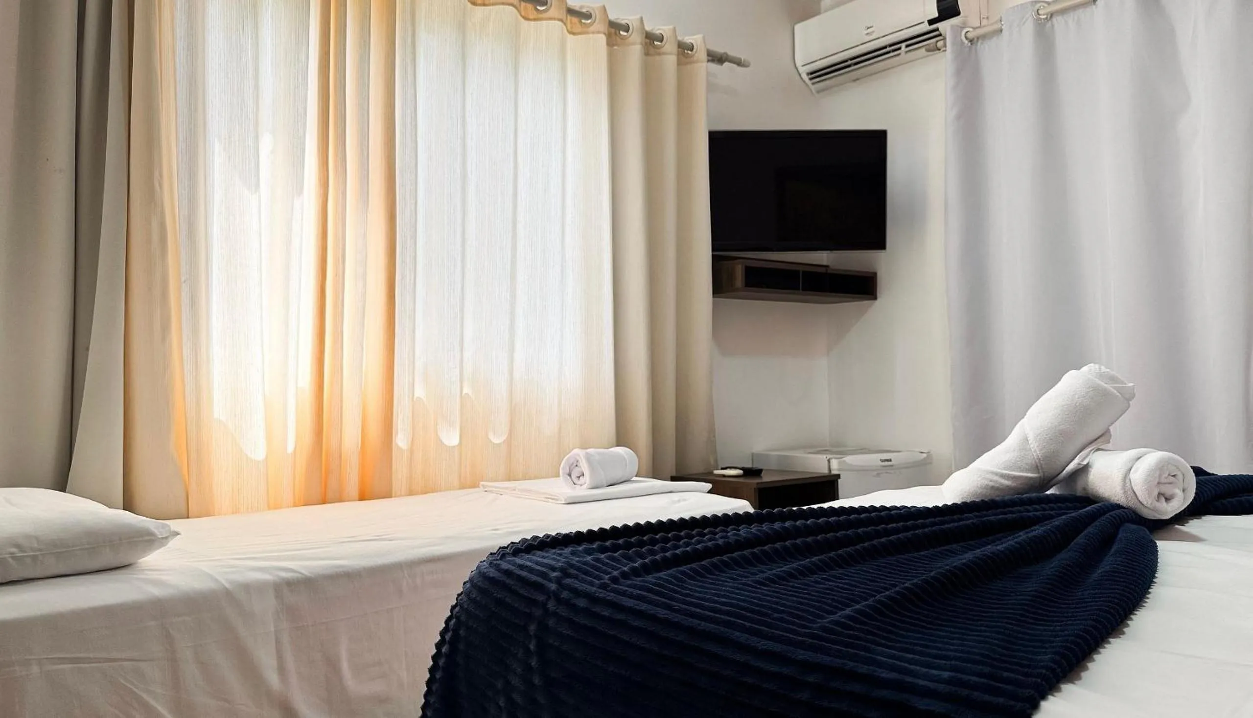 Bed in Pousada Bernúncia - Com café da Manhã, próximo a Praia Grande