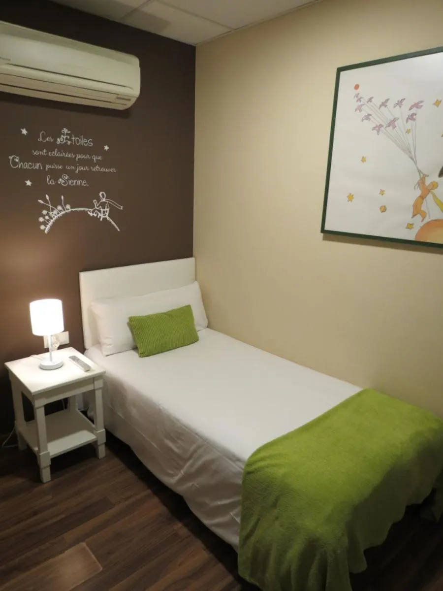 Bed in Hostal Petit Príncep