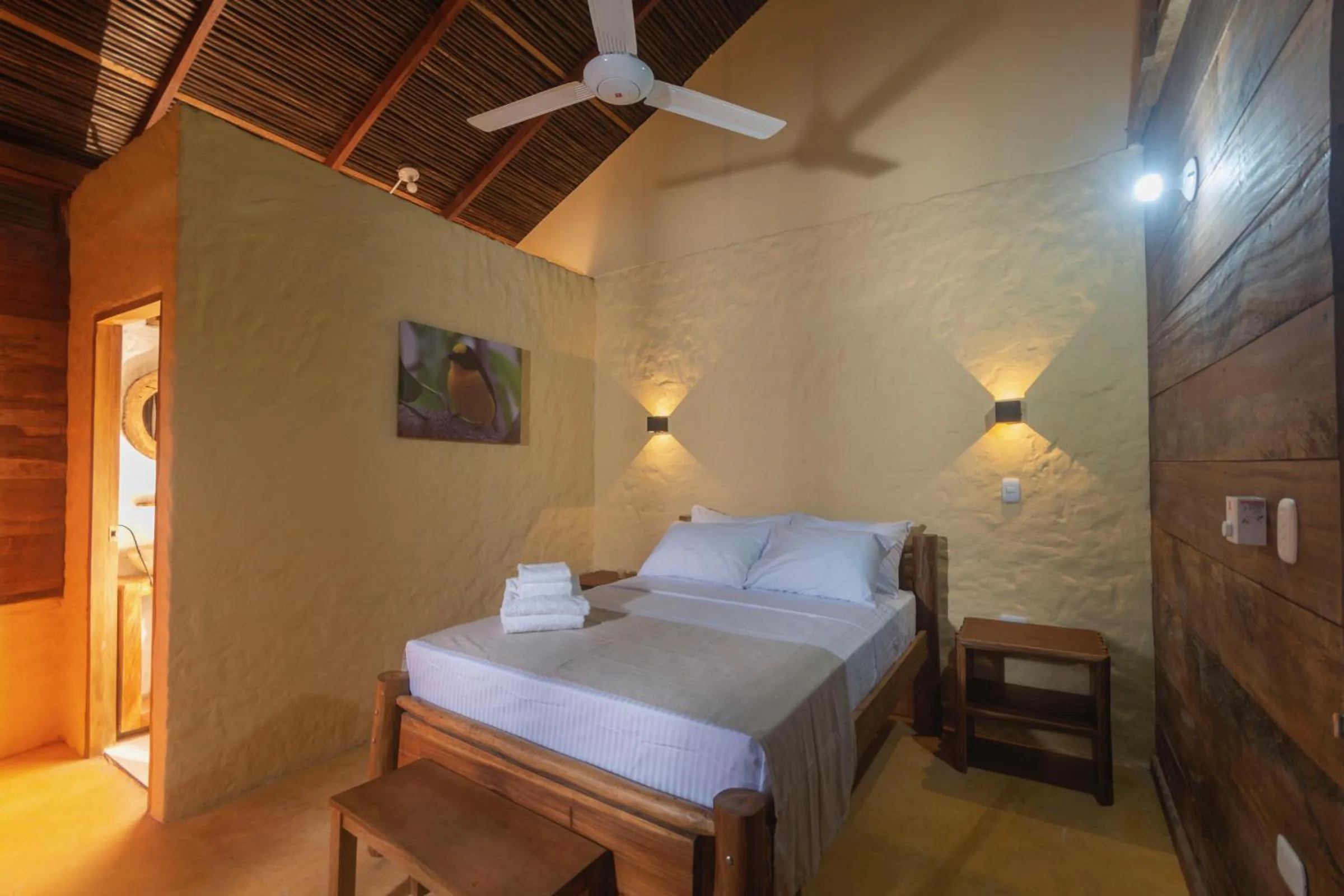 Bed in Samadhi Ecohotel by Rotamundos