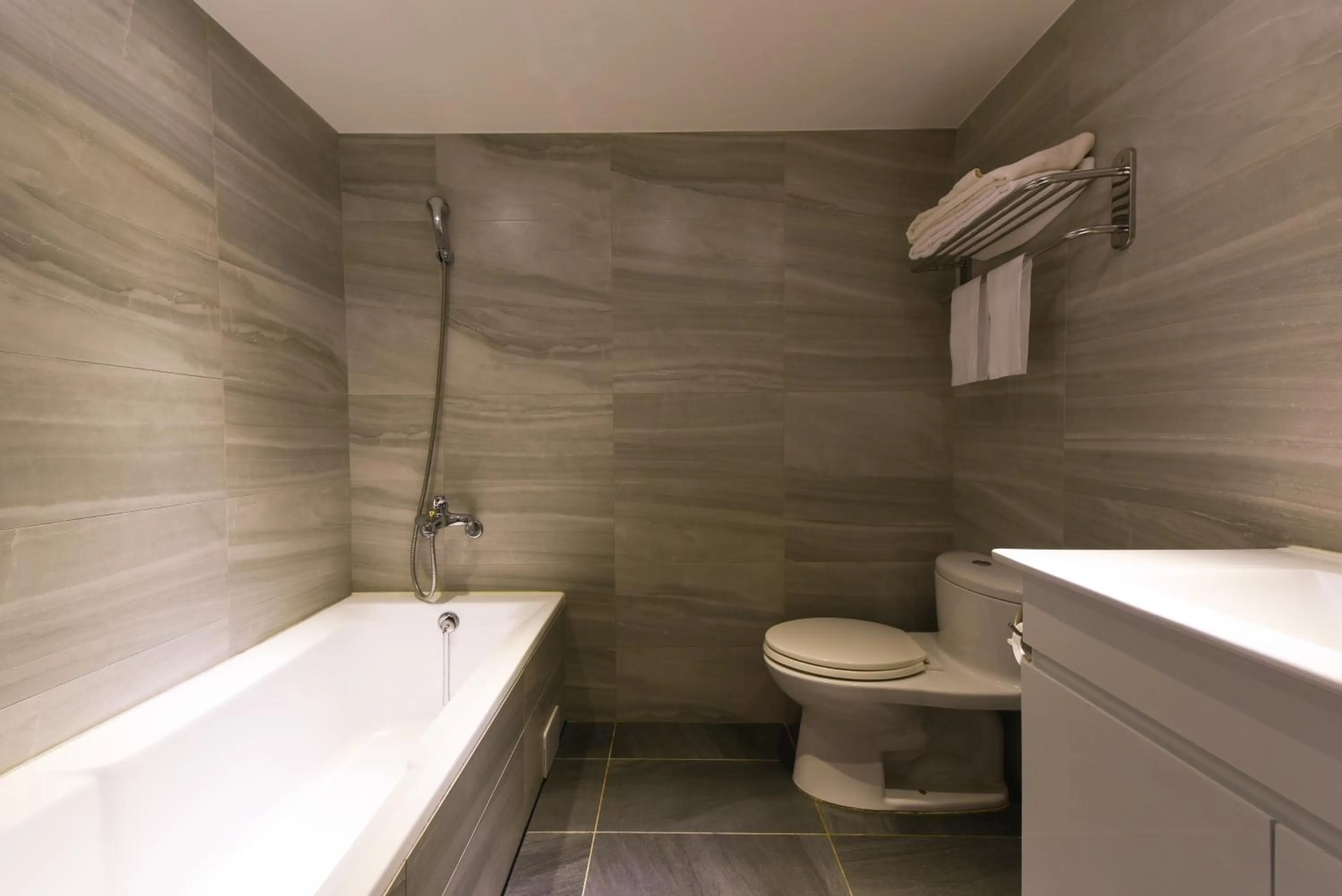 Toilet in Blue Coast Hotel