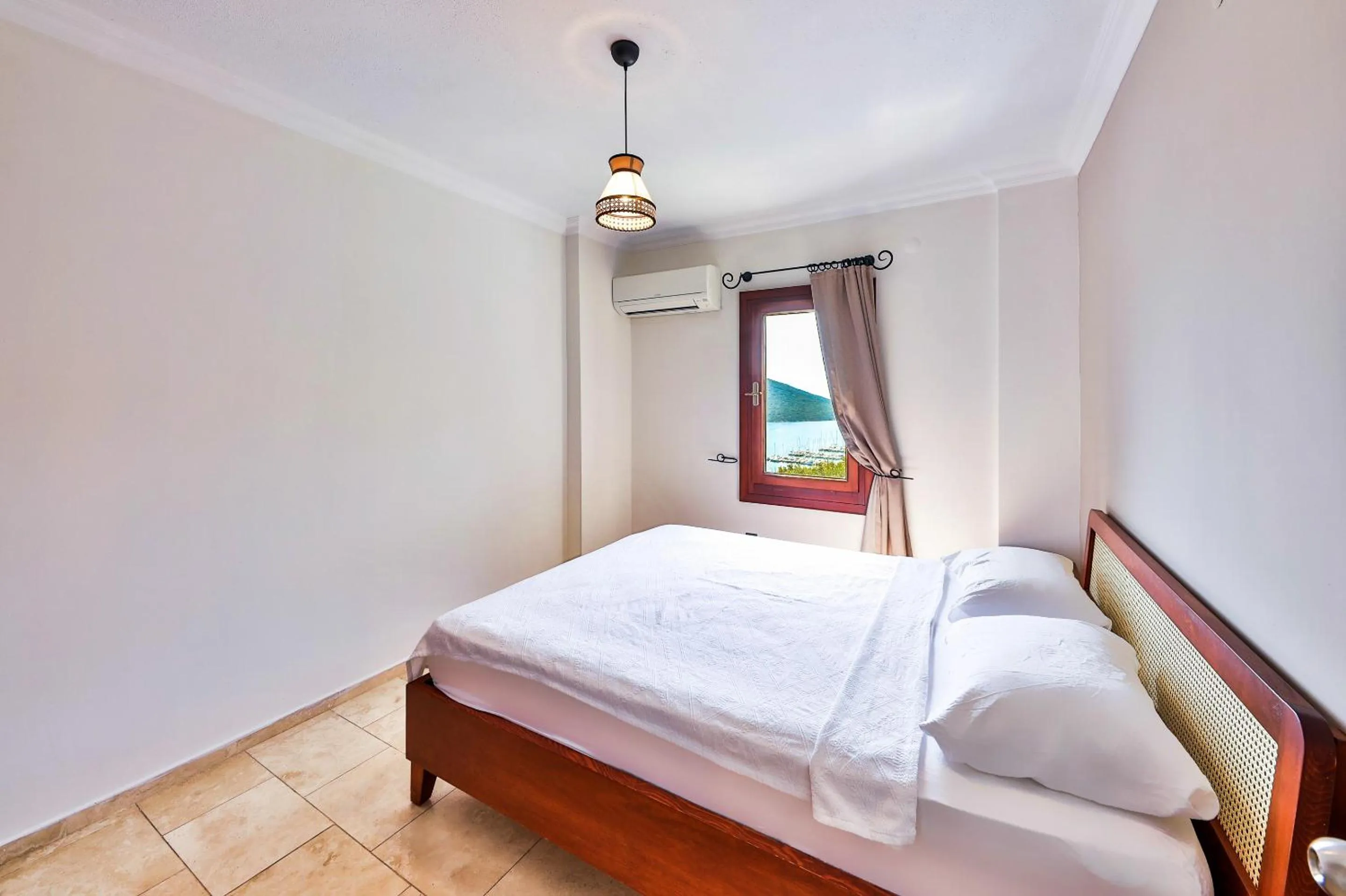 Bed in Nirvana Apartments