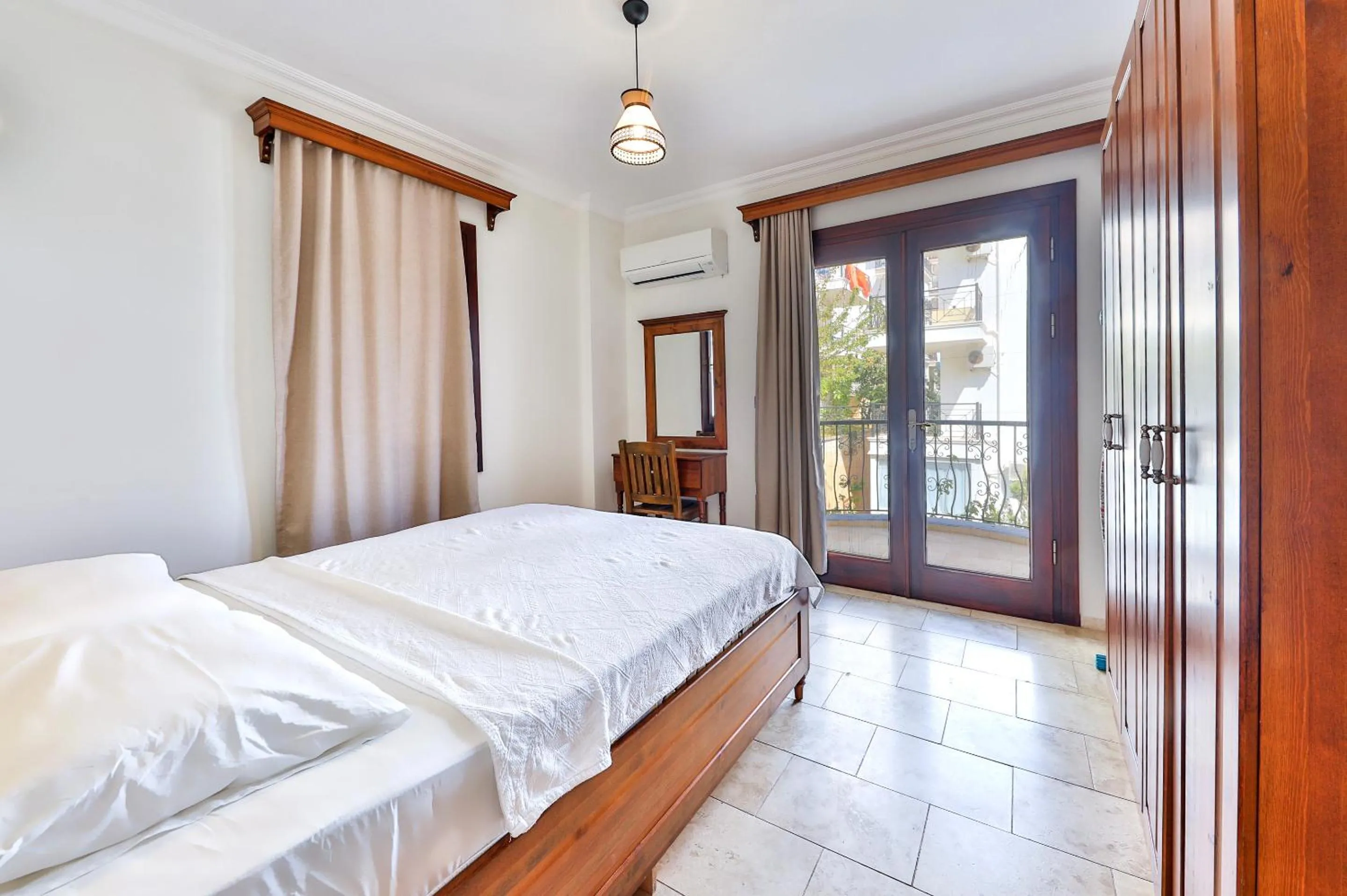 Bed in Nirvana Apartments