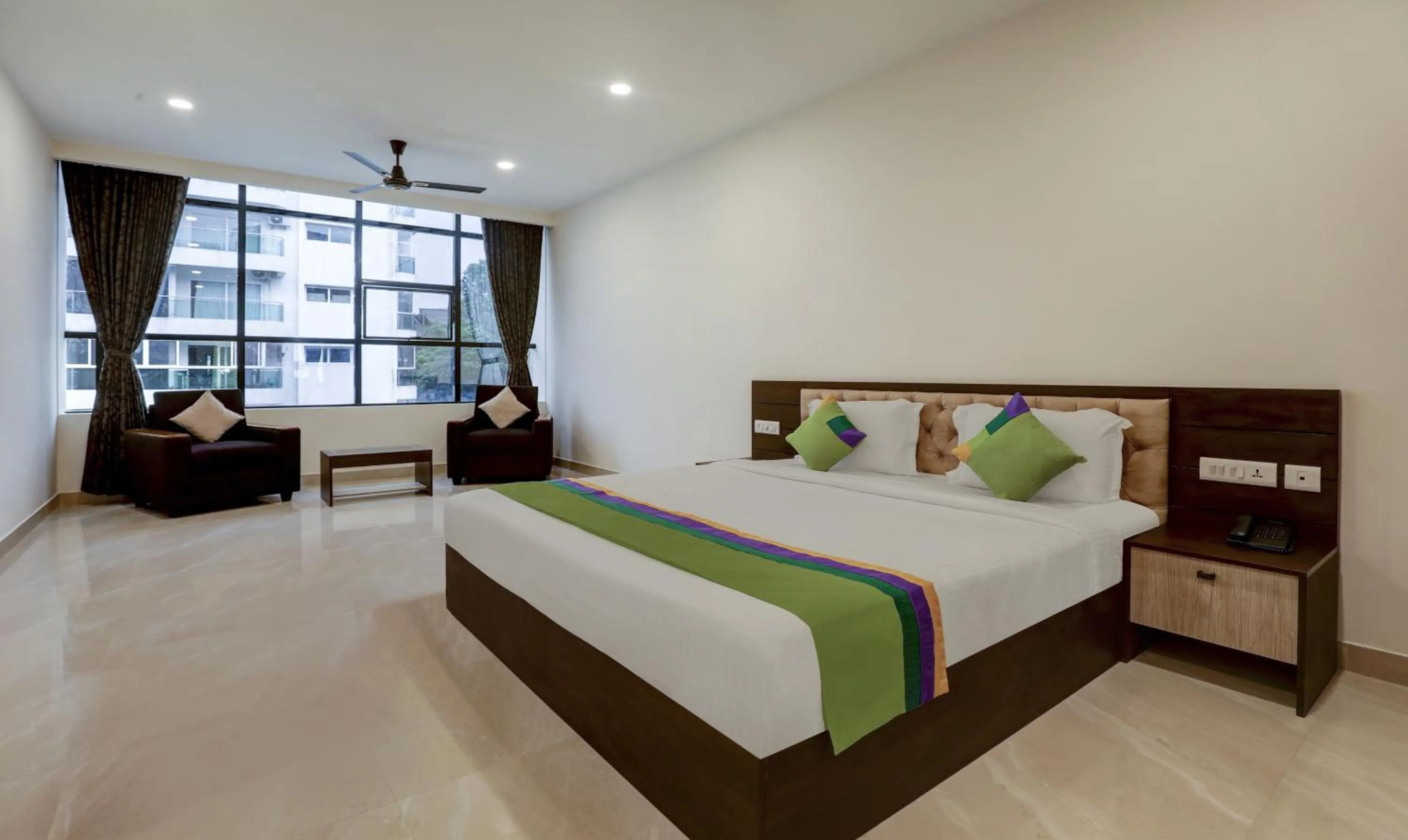 Photo of the whole room, Bed in Treebo The Horizon Kankanady