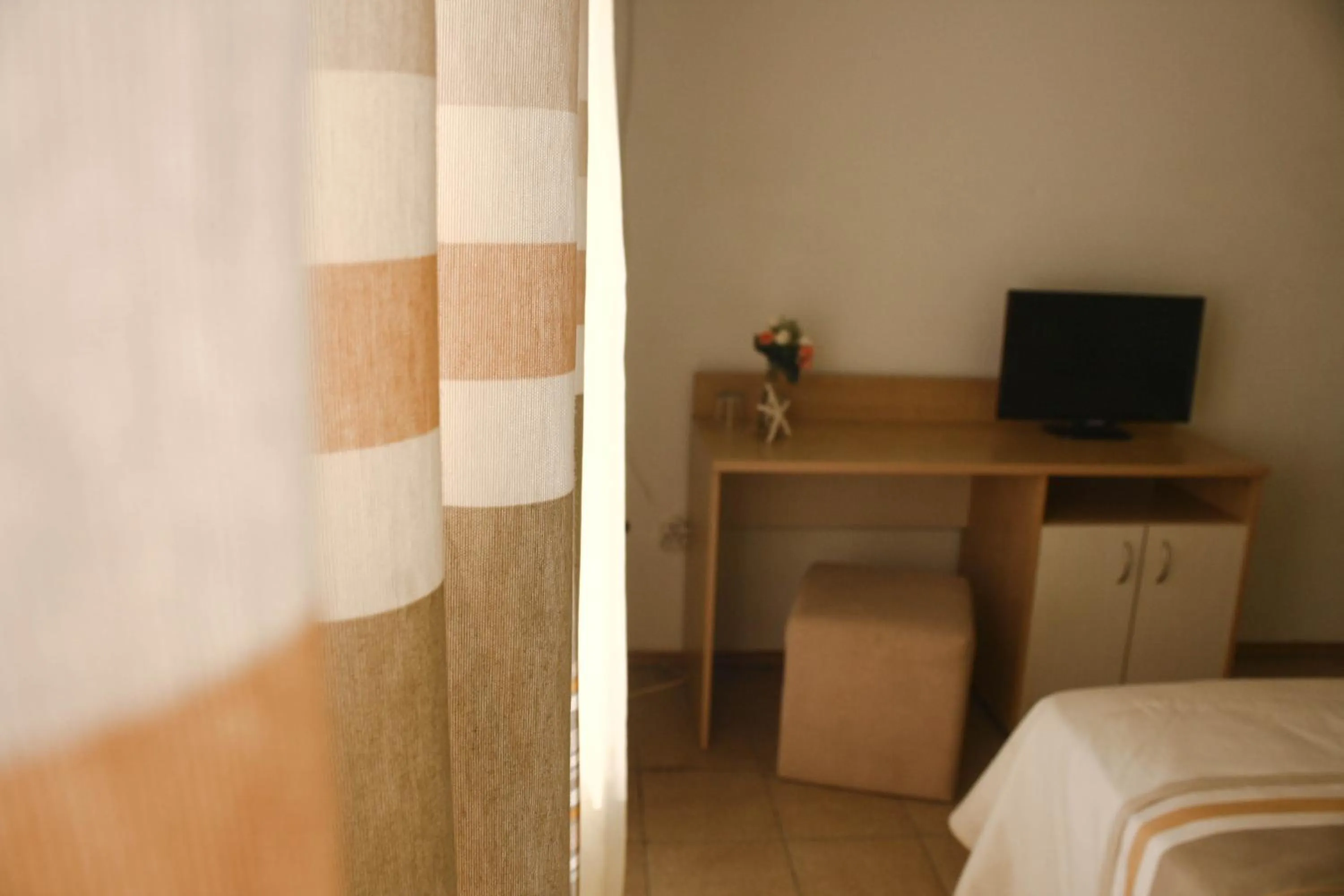 Bed in Alba Family Club Hotel