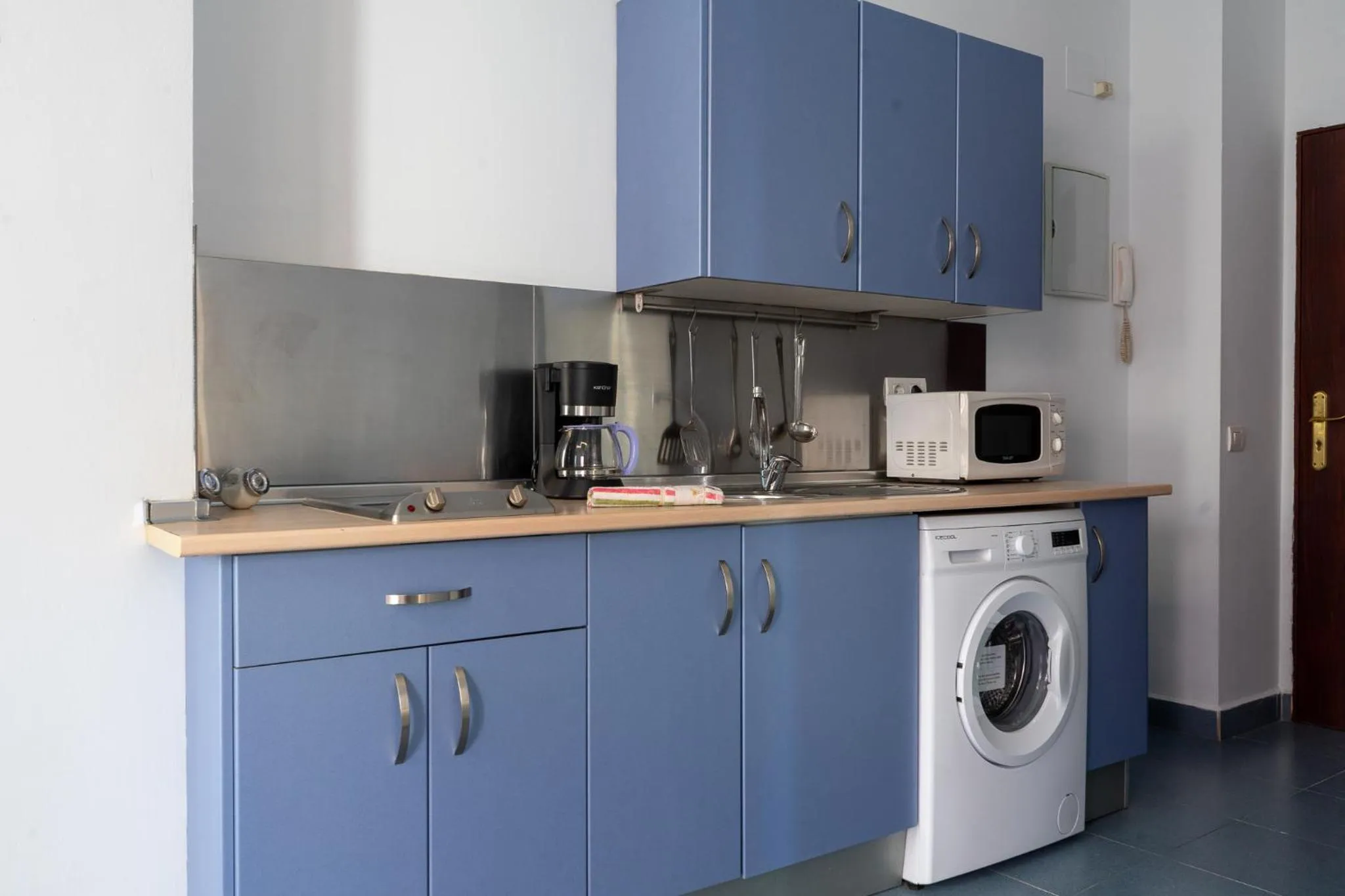 kitchen in Mar y Arte Apartamentos