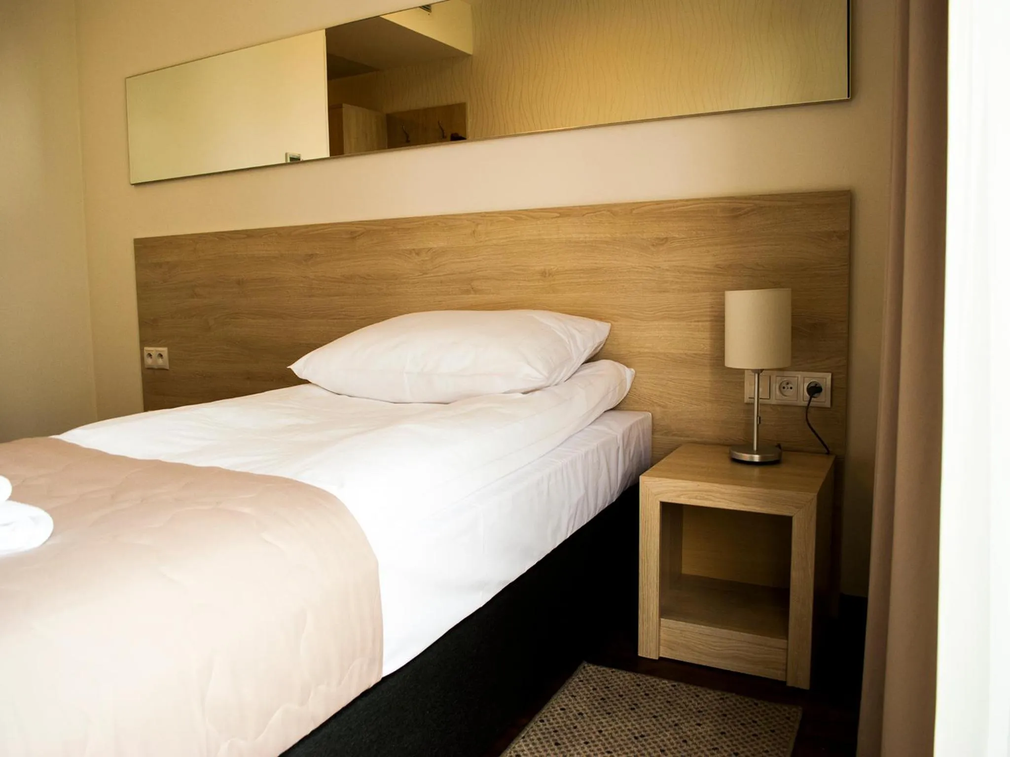 Bed in Hotel Uniejów