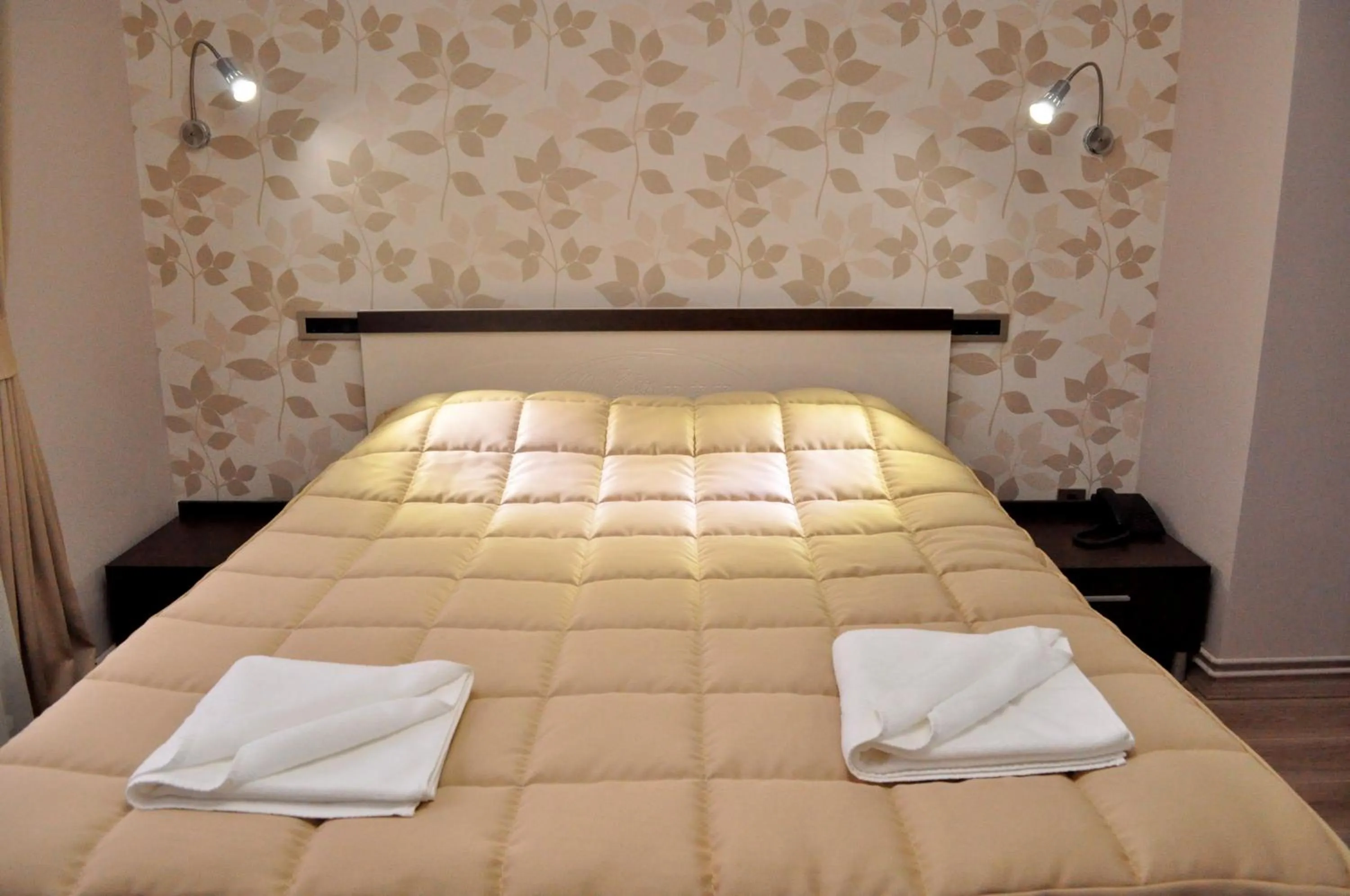 Bed in Garni Hotel 018 In