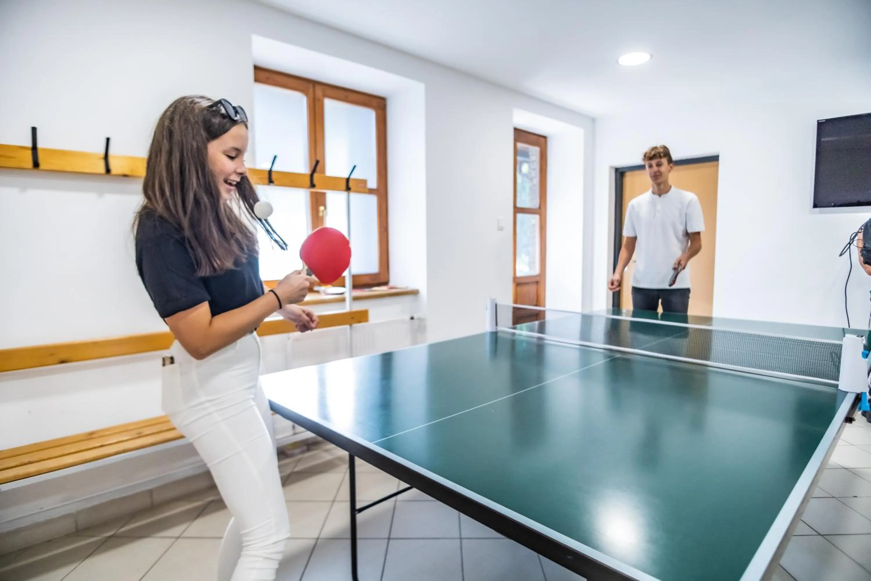 Communal lounge/ TV room in 4 Évszak Hegyihotel